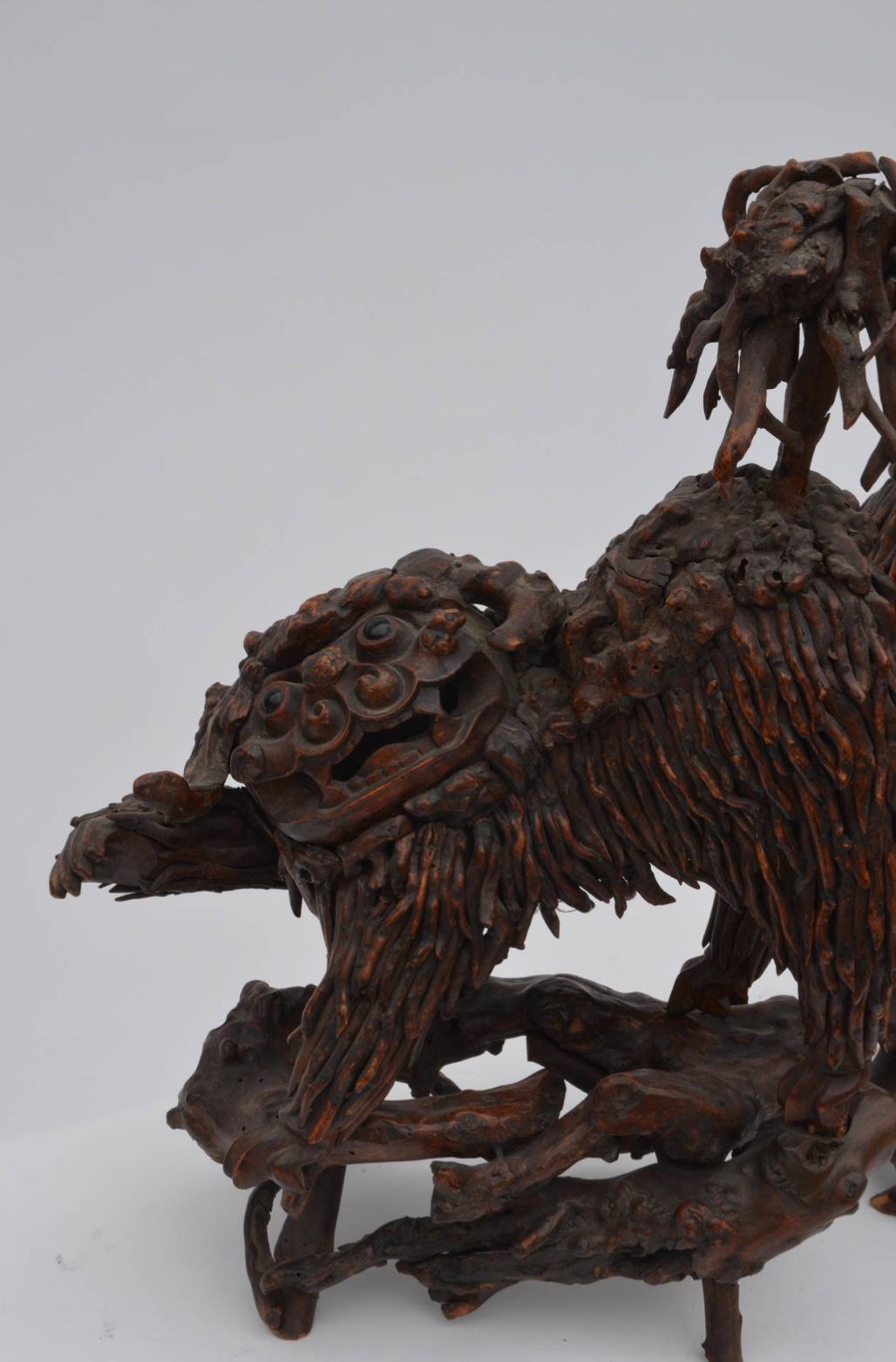 Pair of Rare Chinese Carved Wood Foo Dogs In Good Condition For Sale In Los Angeles, CA