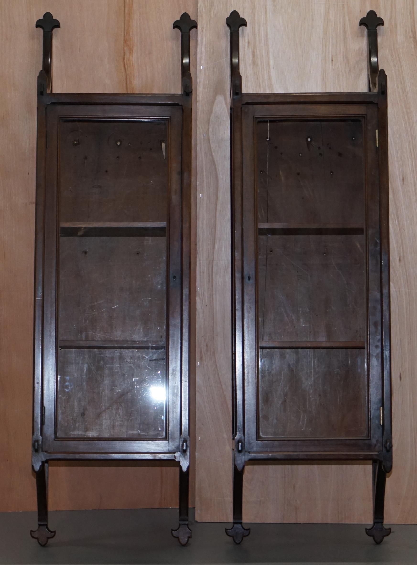 We are delighted to offer for sale this stunning pair of circa 1800 Gothic revival huge wall hanging cabinets

A very good looking and well made pair, these are very large 5’4 tall, they have removable and height adjustable bookshelves, ideally