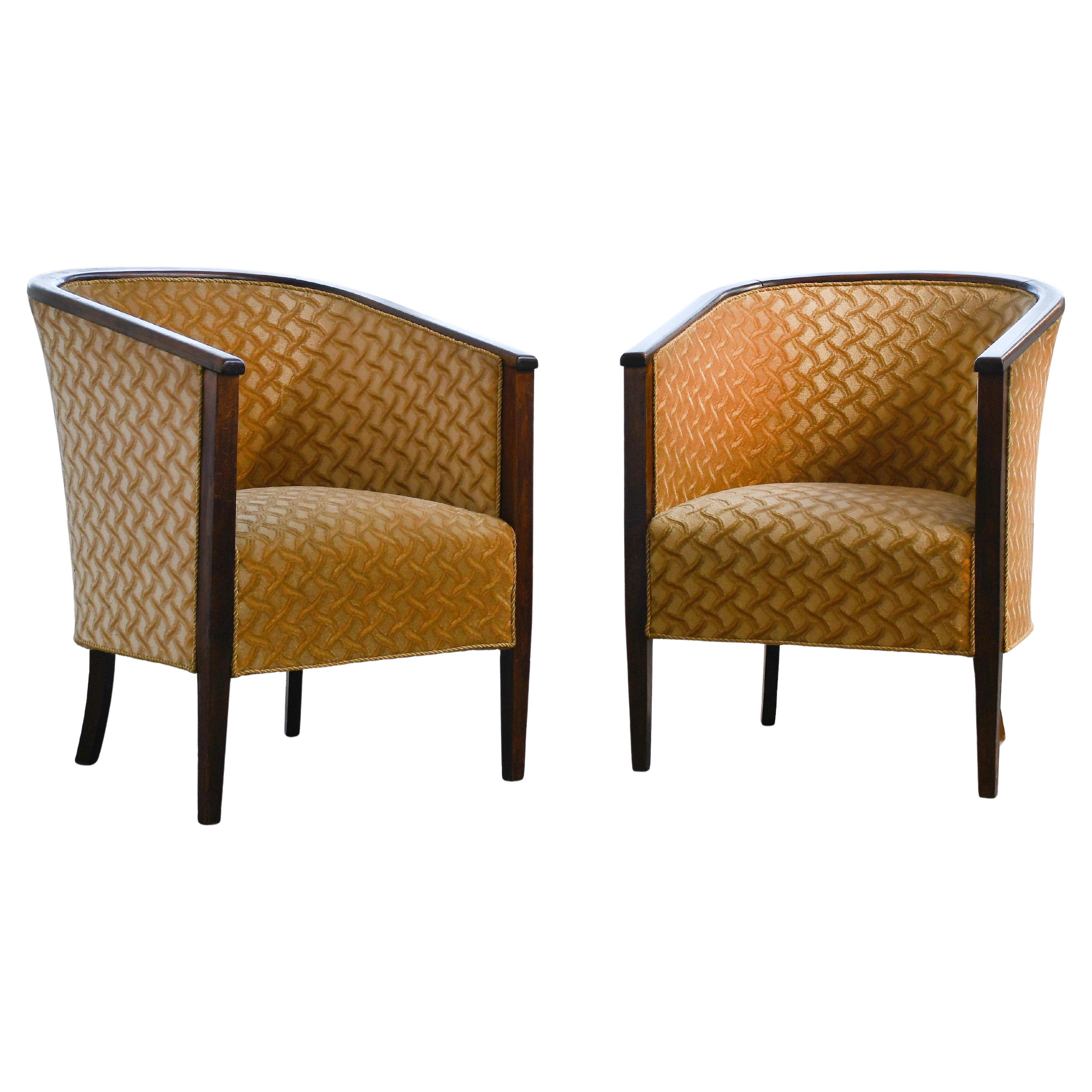 Pair of Rare Danish 1950's Barrel Style Chairs with Stained Oak Armrests