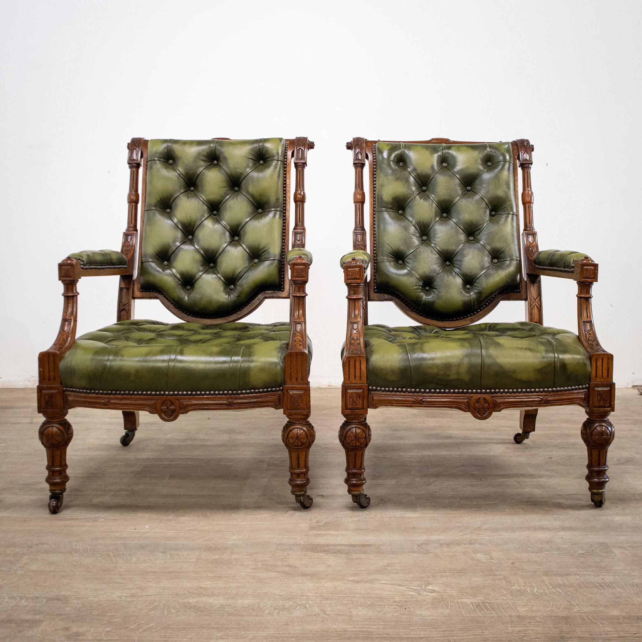A pair of wonderful early Victorian library chairs upholstered in green leather, with buttoned backs and seats.
- Leather in good condition, without cracks or significant wear.
- Brown ceramic castors.
- Deep, low seats.
- Attractively carved
