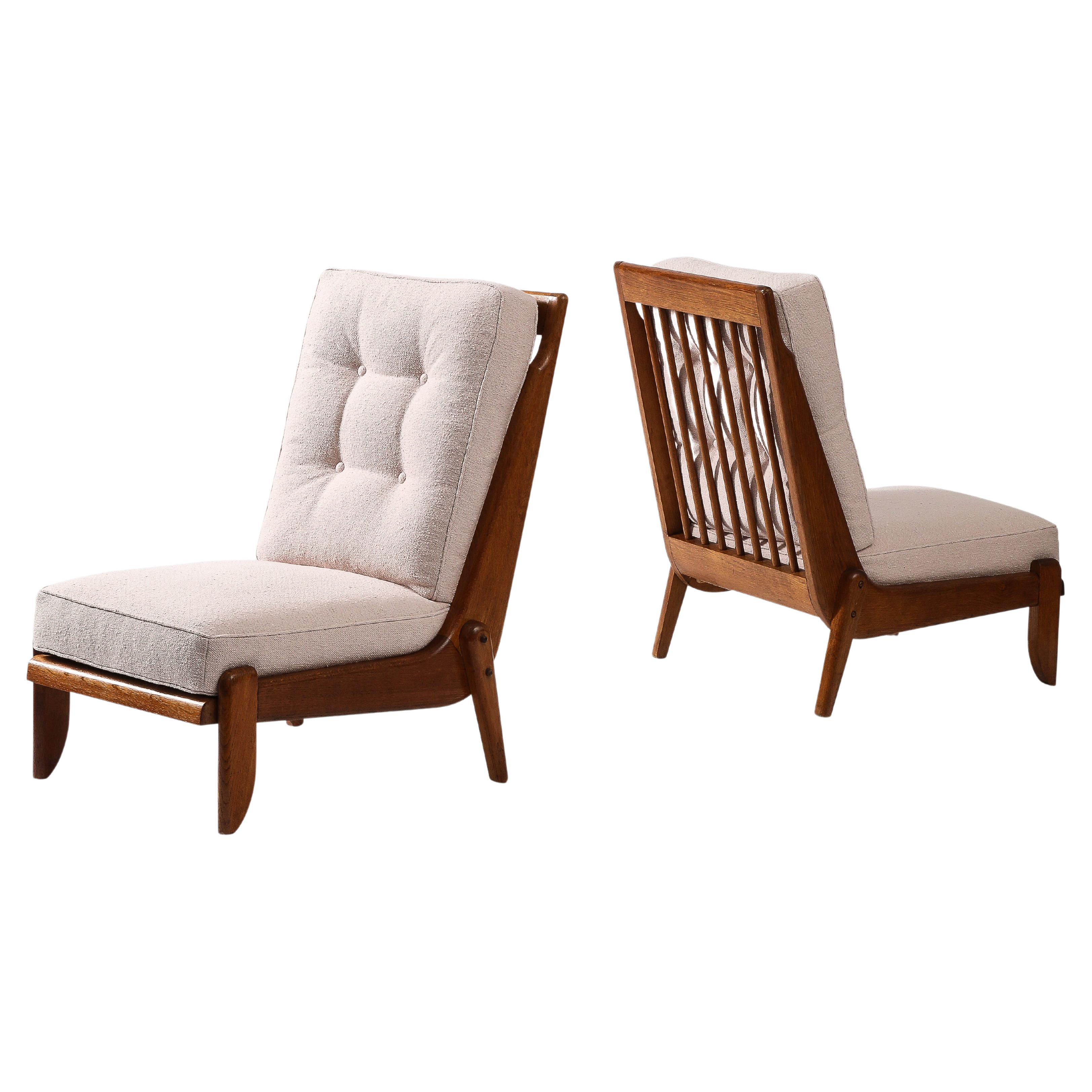 Pair of Rare Guillerme et Chambron Oak Lounge Chairs, France, c. 1960