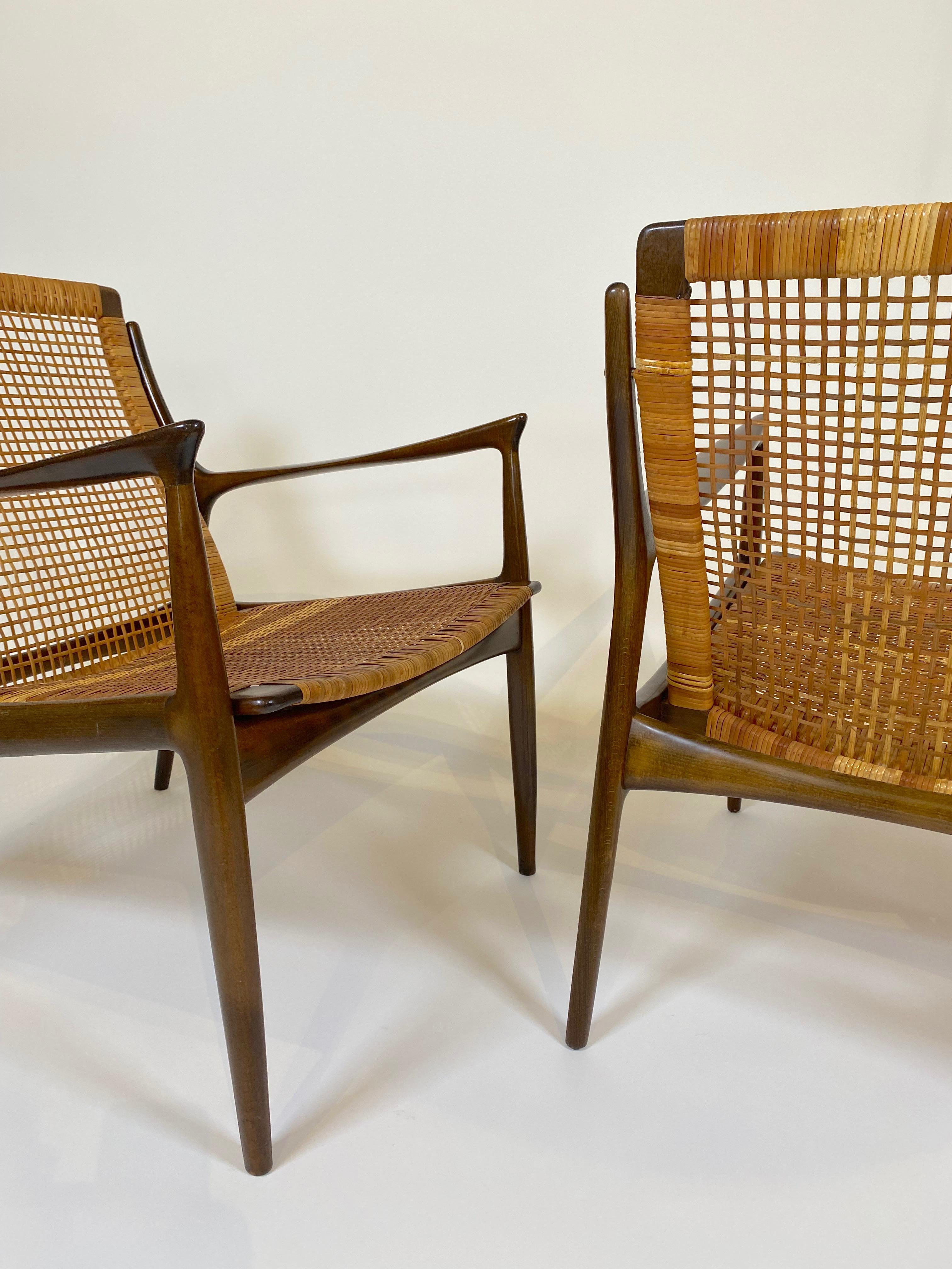 Wood Pair of Rare Ib Kofod, Larsen Cane Back & Seat Armchairs