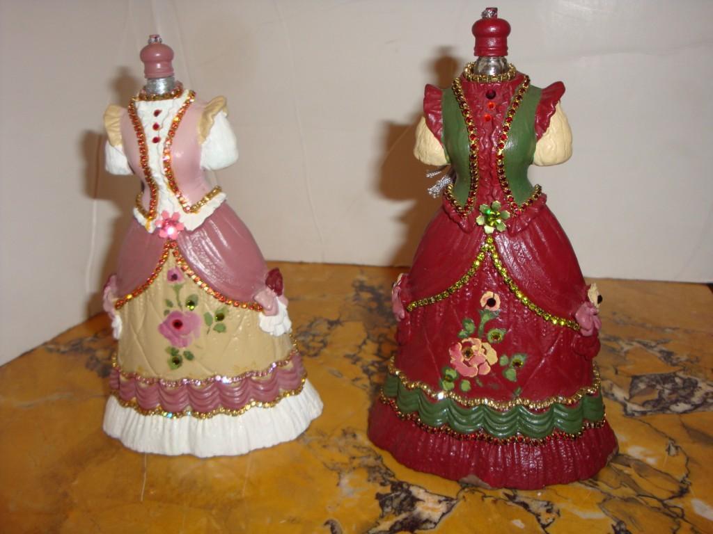 The Following Item we are offering is a Rare Pair of French Vintage Handpainted Perfume Bottles with Stunning Fringed Applicators. Bottles are each handpainted Beautiful Colors and contain Gorgeous Colored Crystals. Beautifully done with Outstanding