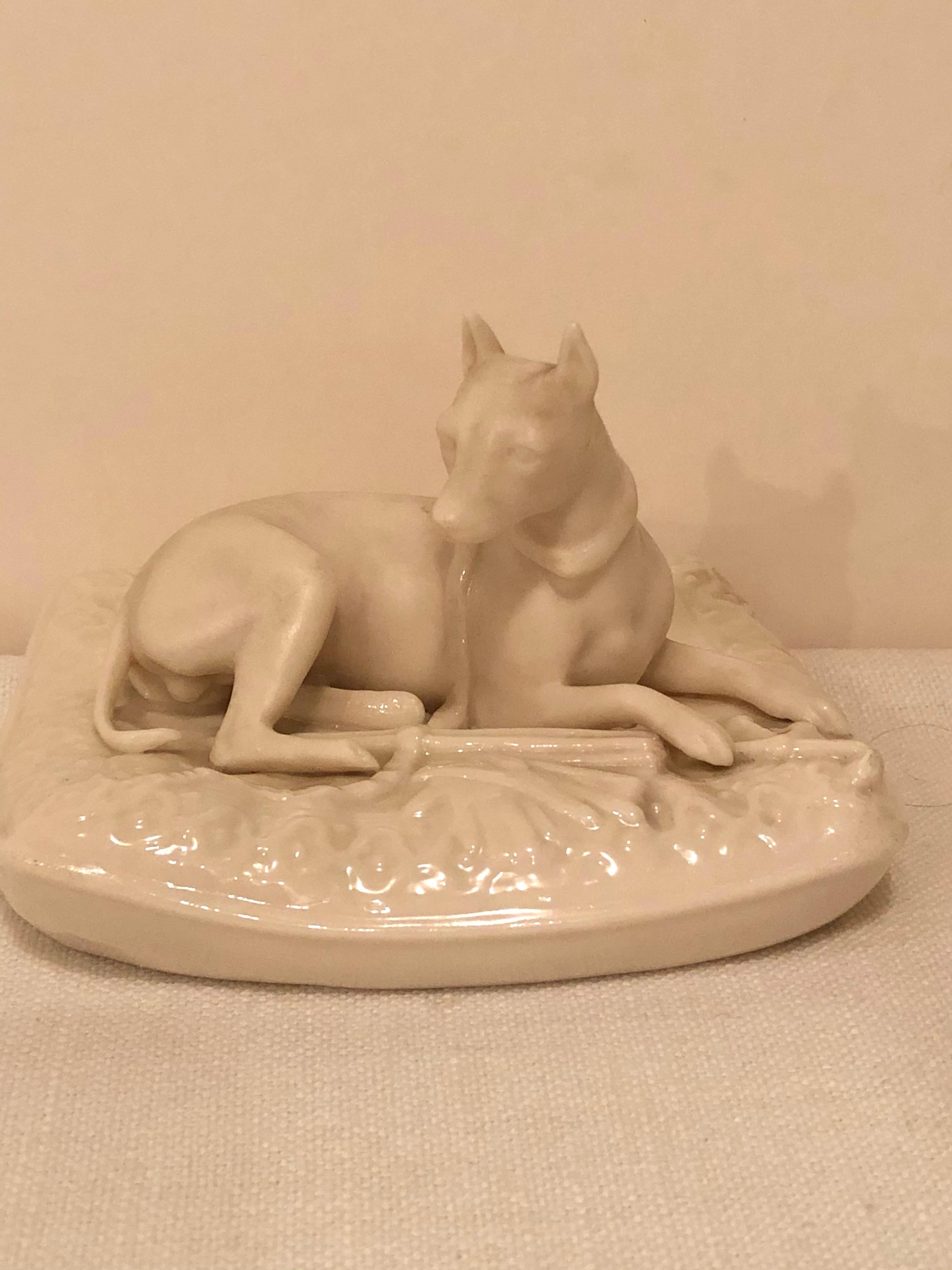 Mid-20th Century Pair of Rare Irish Belleek Figures of Dogs on Their Pillow Beds