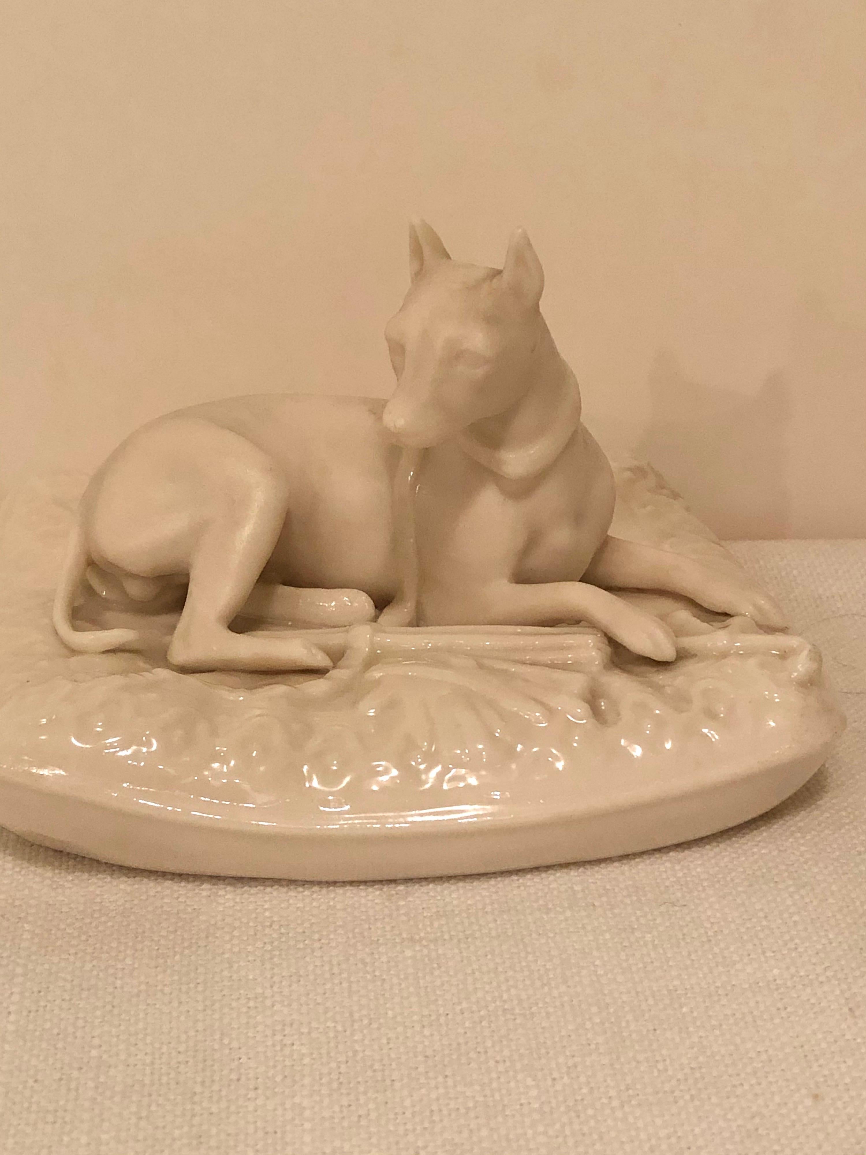 Porcelain Pair of Rare Irish Belleek Figures of Dogs on Their Pillow Beds