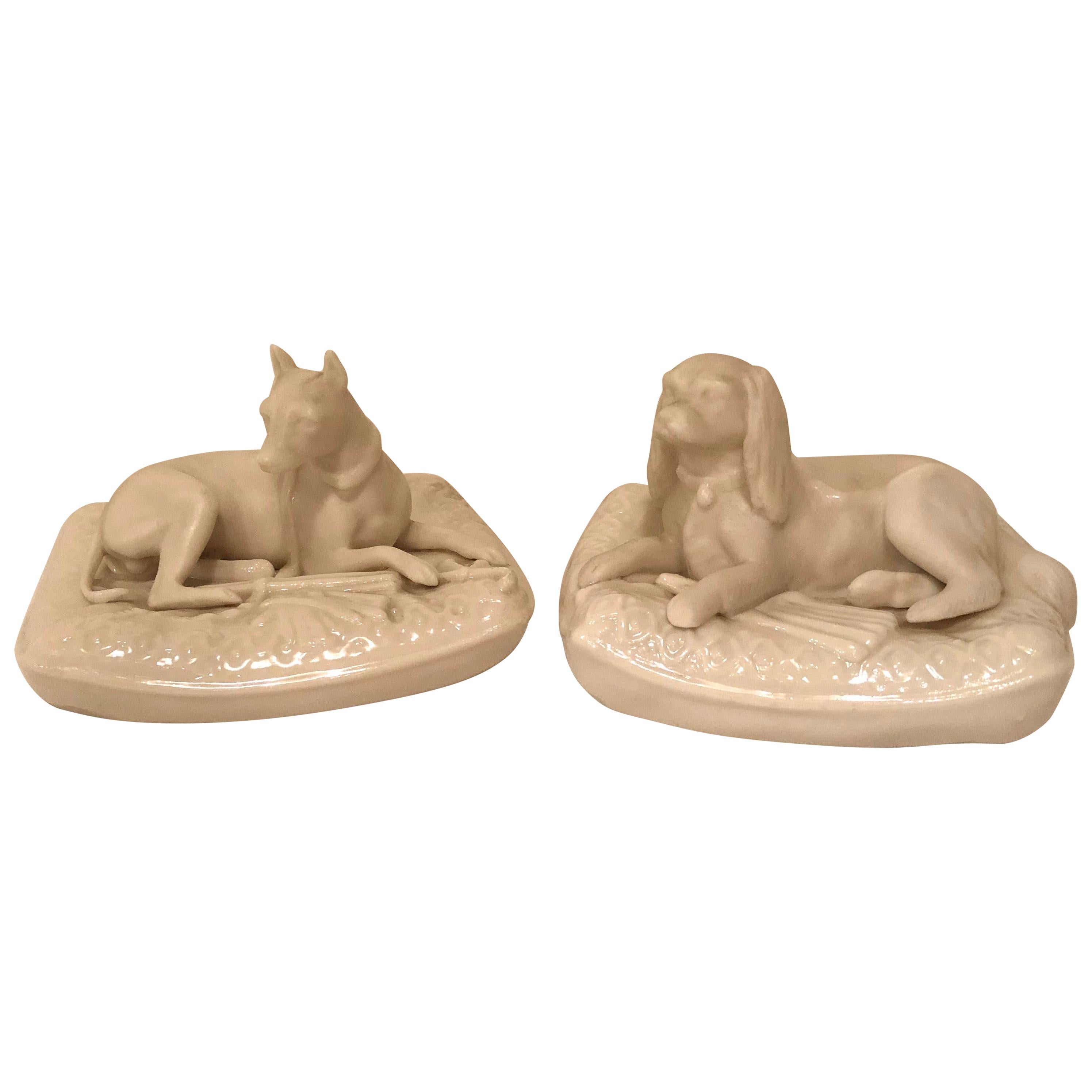 Pair of Rare Irish Belleek Figures of Dogs on Their Pillow Beds