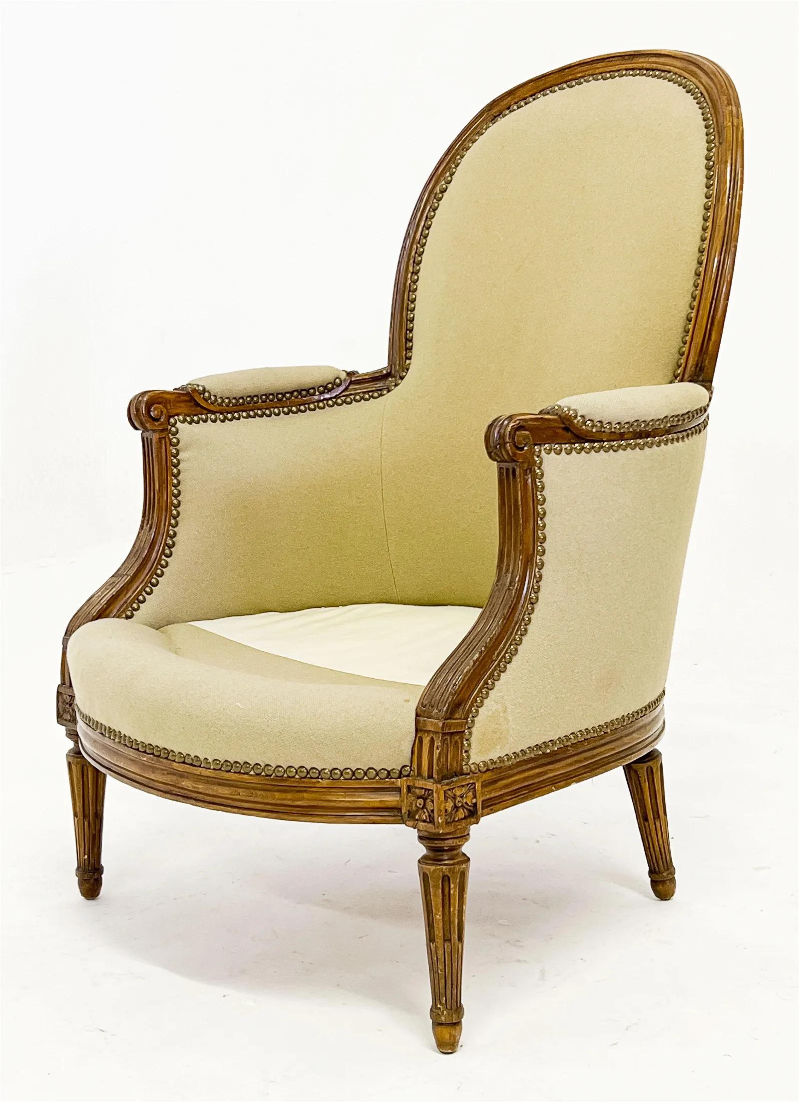 Beech Pair of Rare Louis XVI Bergeres, Stamped Claude Chevigny For Sale