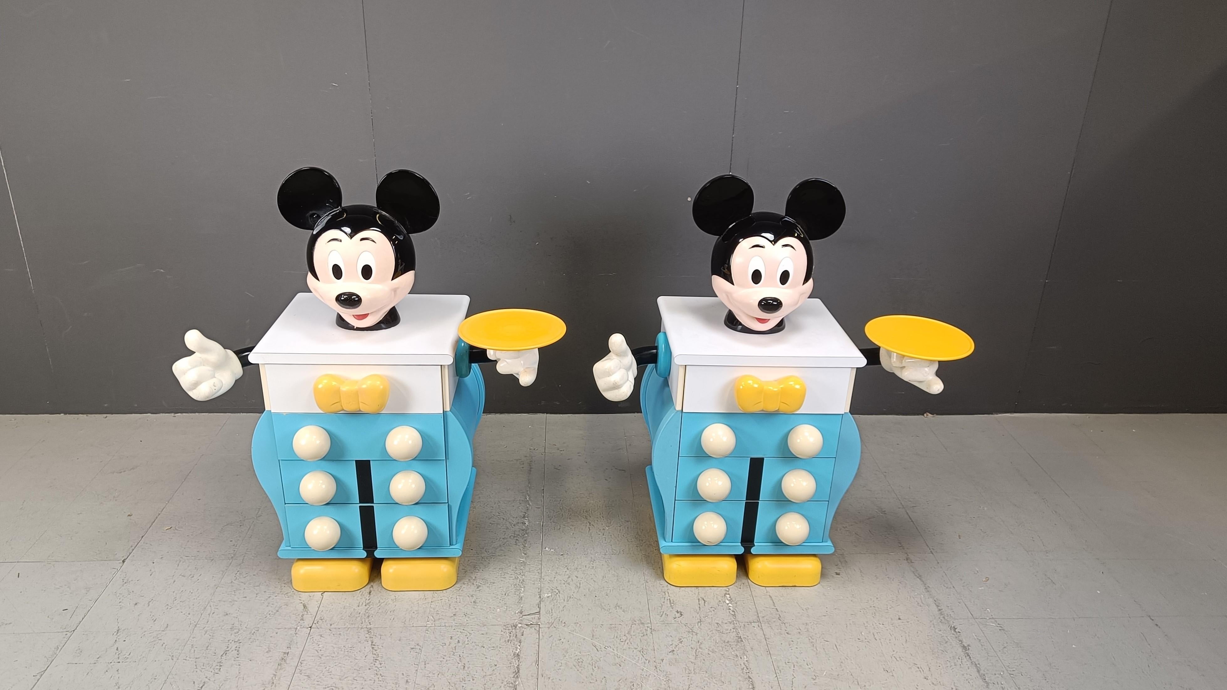 Pair of rare Mickey Mouse bedside cabinets designed by Pierre Colleu.

Made of laminated wood, plastics, and resins. 

Very rare to find a matching pair.

Good overall condition, normal age related wear.

1980s - France

Dimensions:
Height: