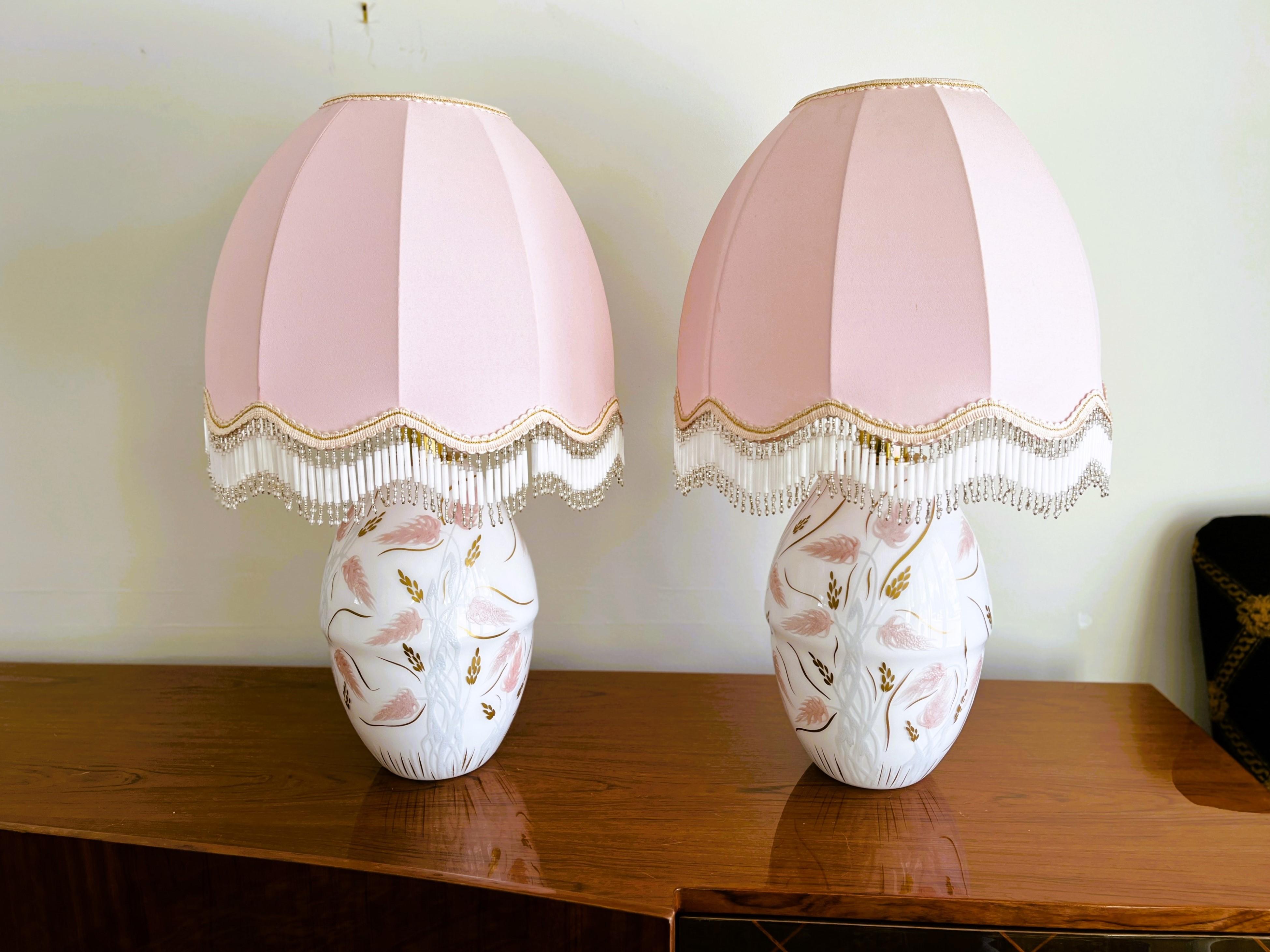 A rare pair of Murano De Baisi table lamps. Hand-painted in pink, gold and light blue. Hand-signed, Lavorazione a Mano (handmade) Mario De Biasi.