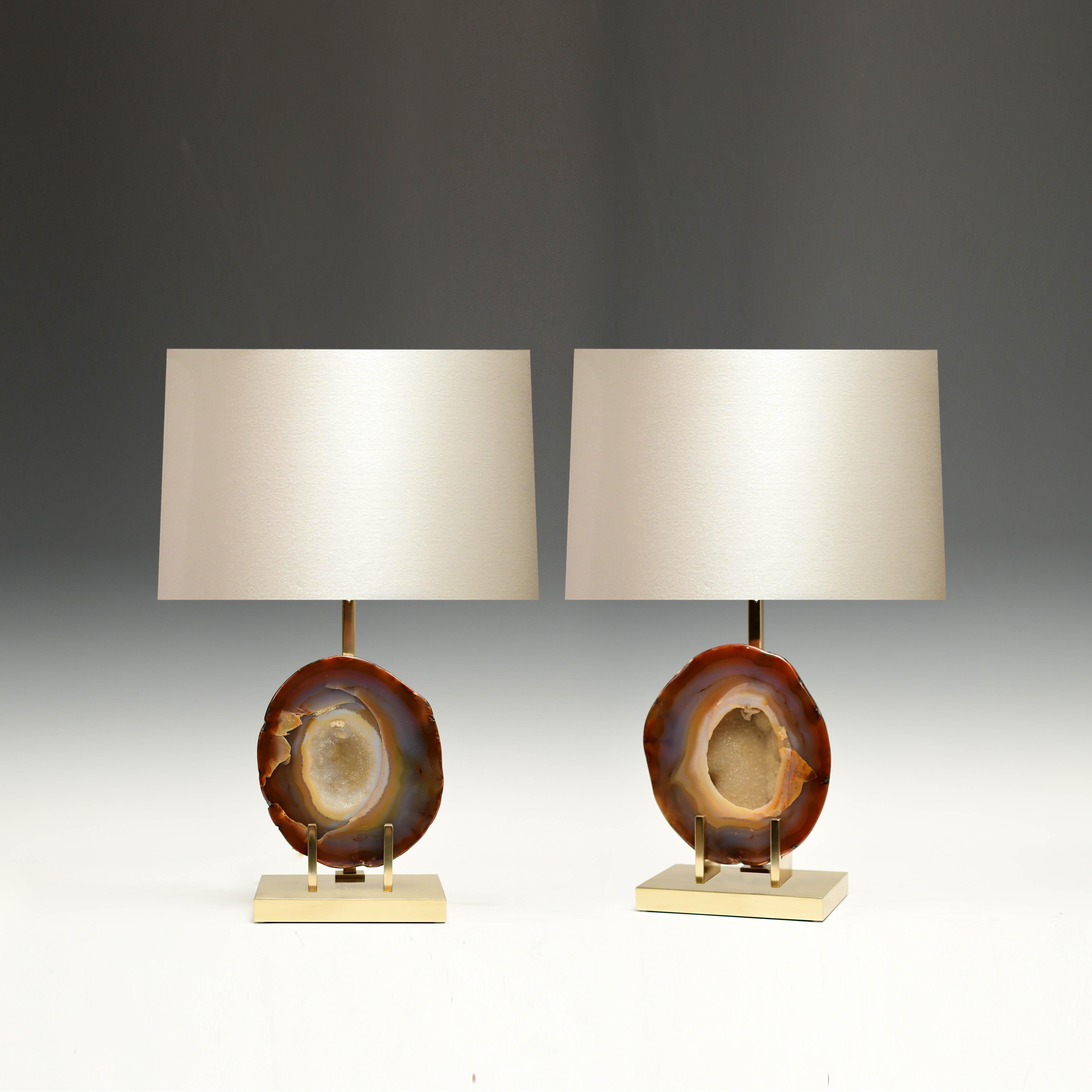 Pair of rare natural agate mounts as lamps with polish brass finish stand, created by Phoenix Gallery.
(Lampshade not included).