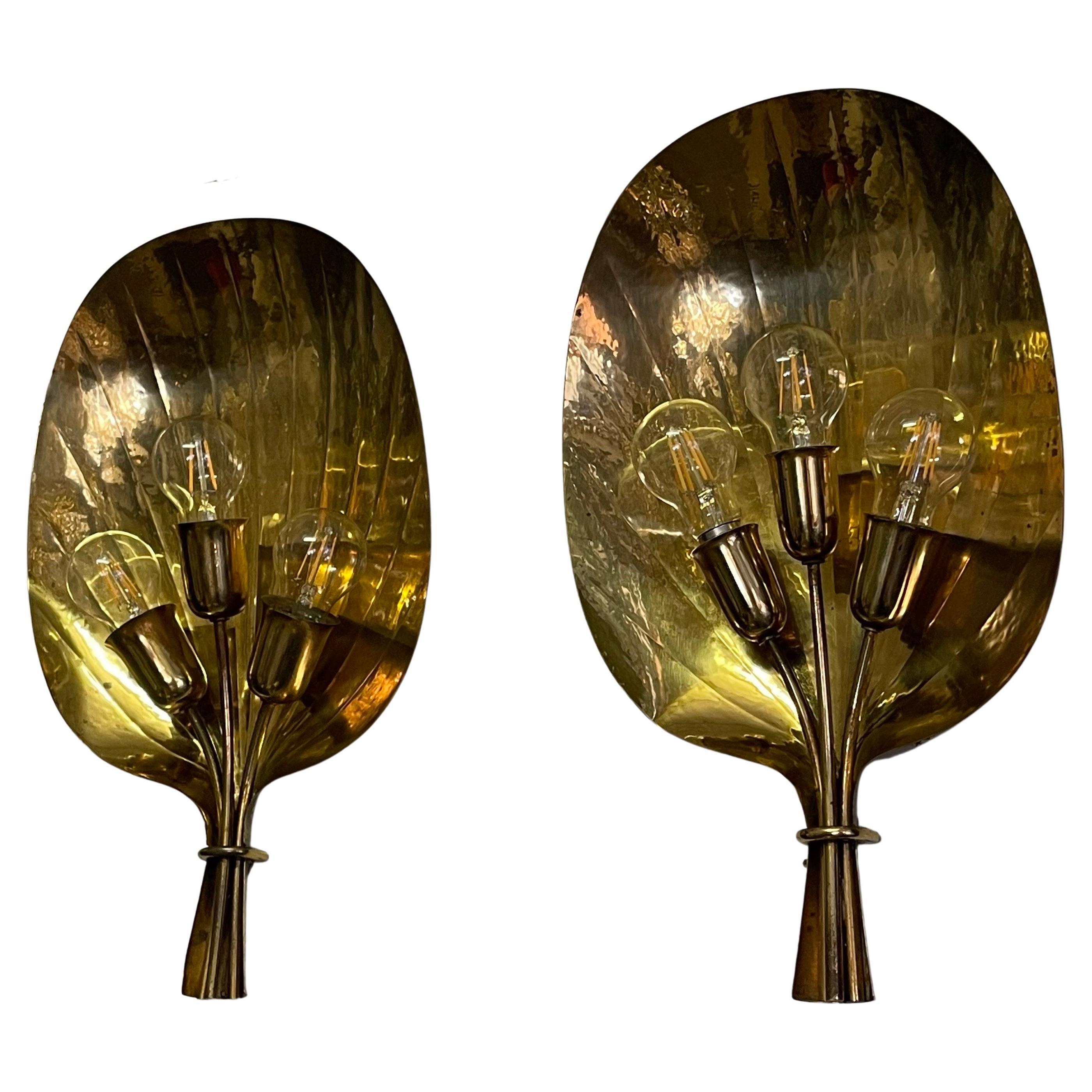 Pair of rare Scandinavian mid- century hammered and polished brass 