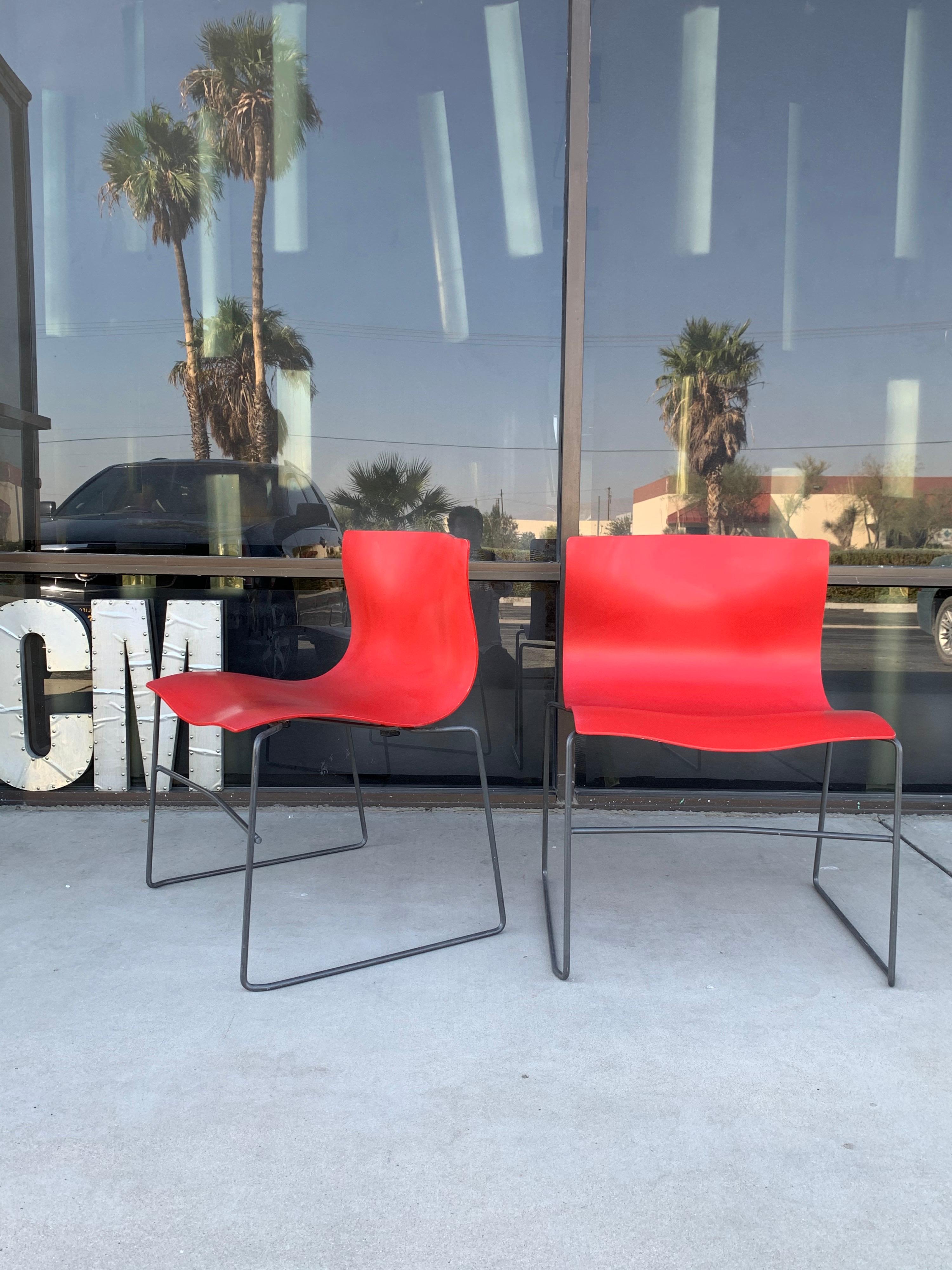 These pair of rare red handkerchief chairs made by Knoll and designed by Massimo Vignelli were made in 1985. Signed with metal plaque underneath. All original.