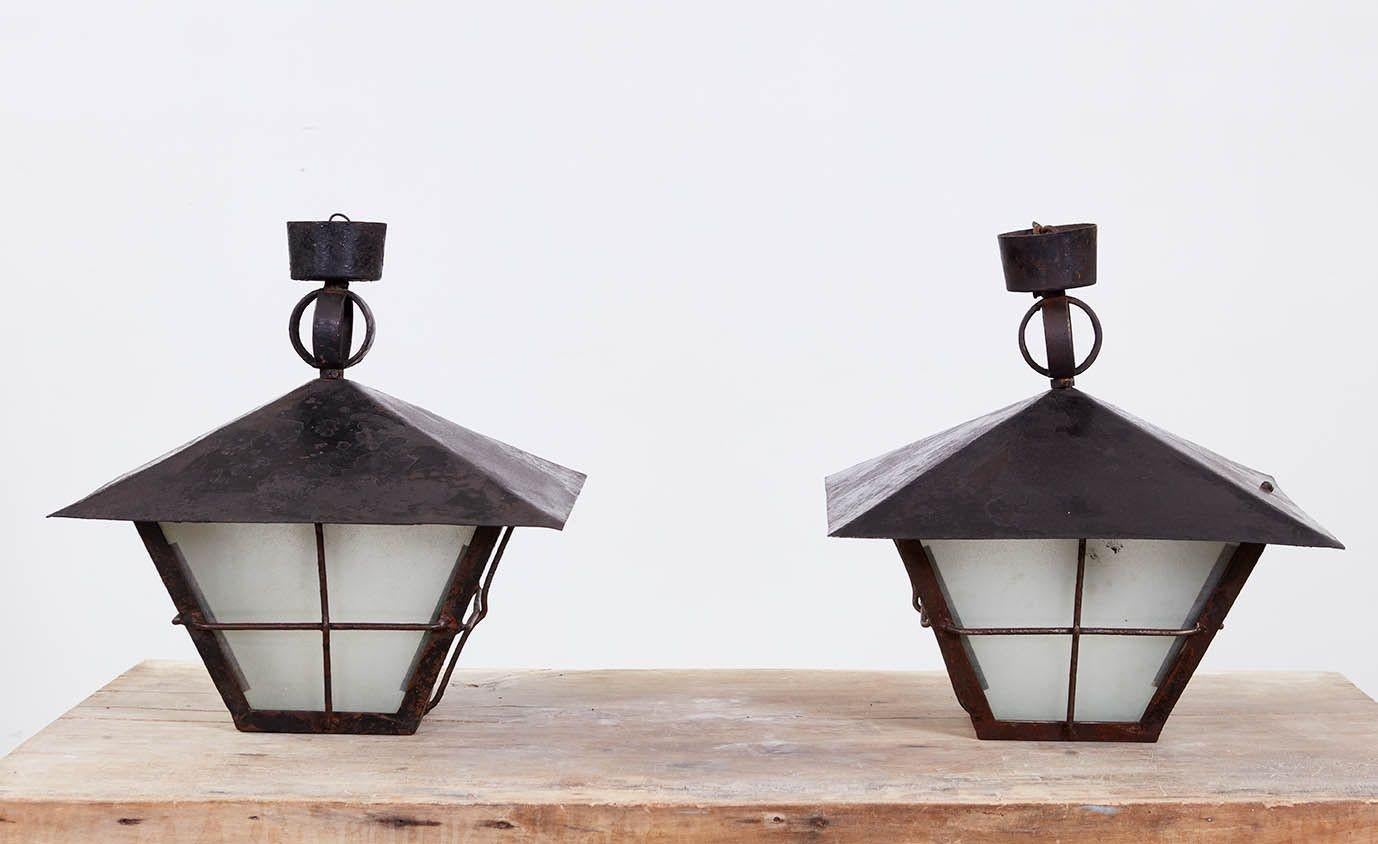 Pair of Rare Salvaged 1920s Iron Marketplace Lanterns In Good Condition For Sale In Greenwich, CT