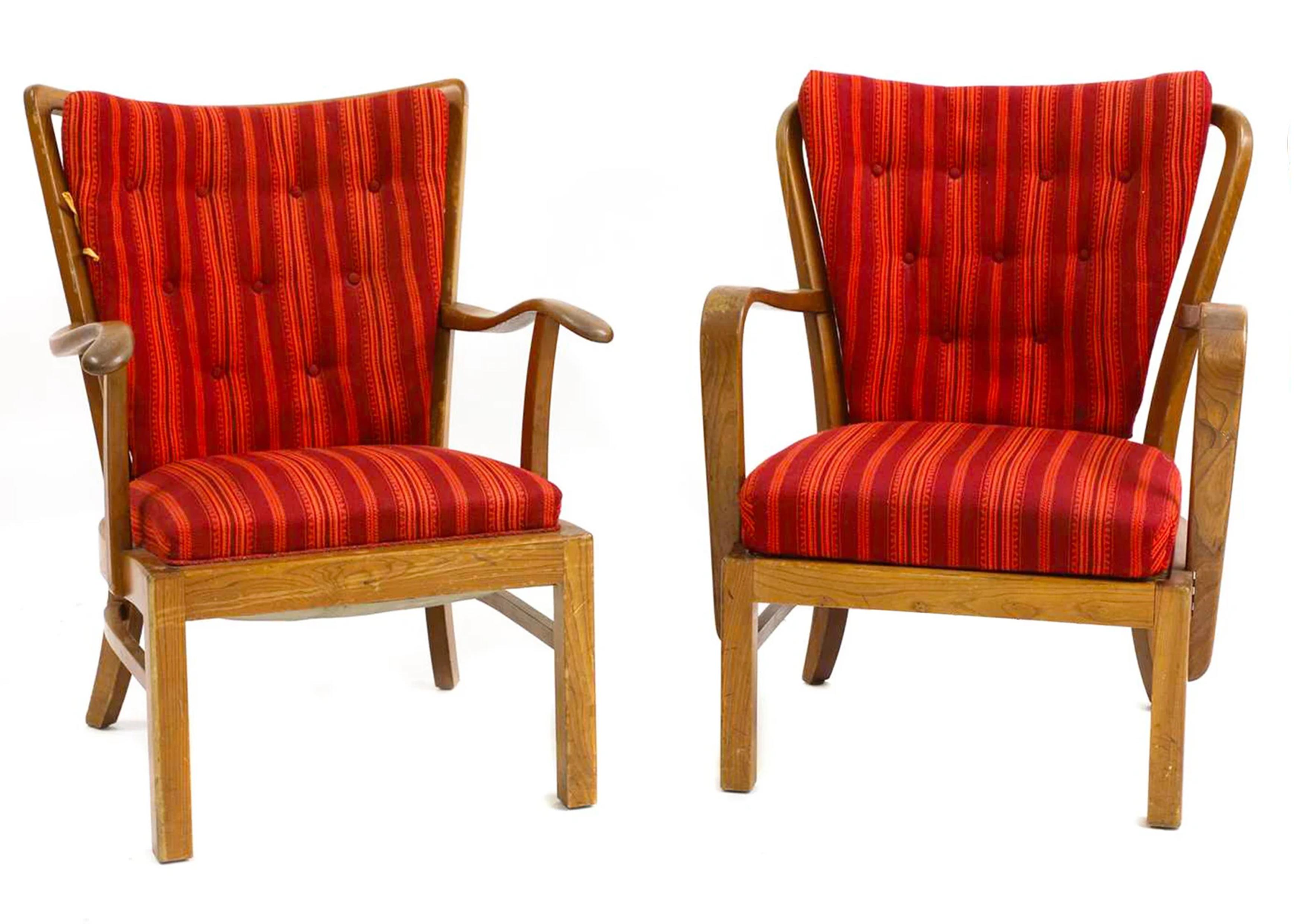 A pair of his and hers Fritz Hansen Model 1628 stained beech open framed armchair with red upholstery designed by Søren Hansen made in Denmark in the 1940s 

Fritz Hansen FH brand mark stamped to the under frame of the chair.

Fritz Hansen, also