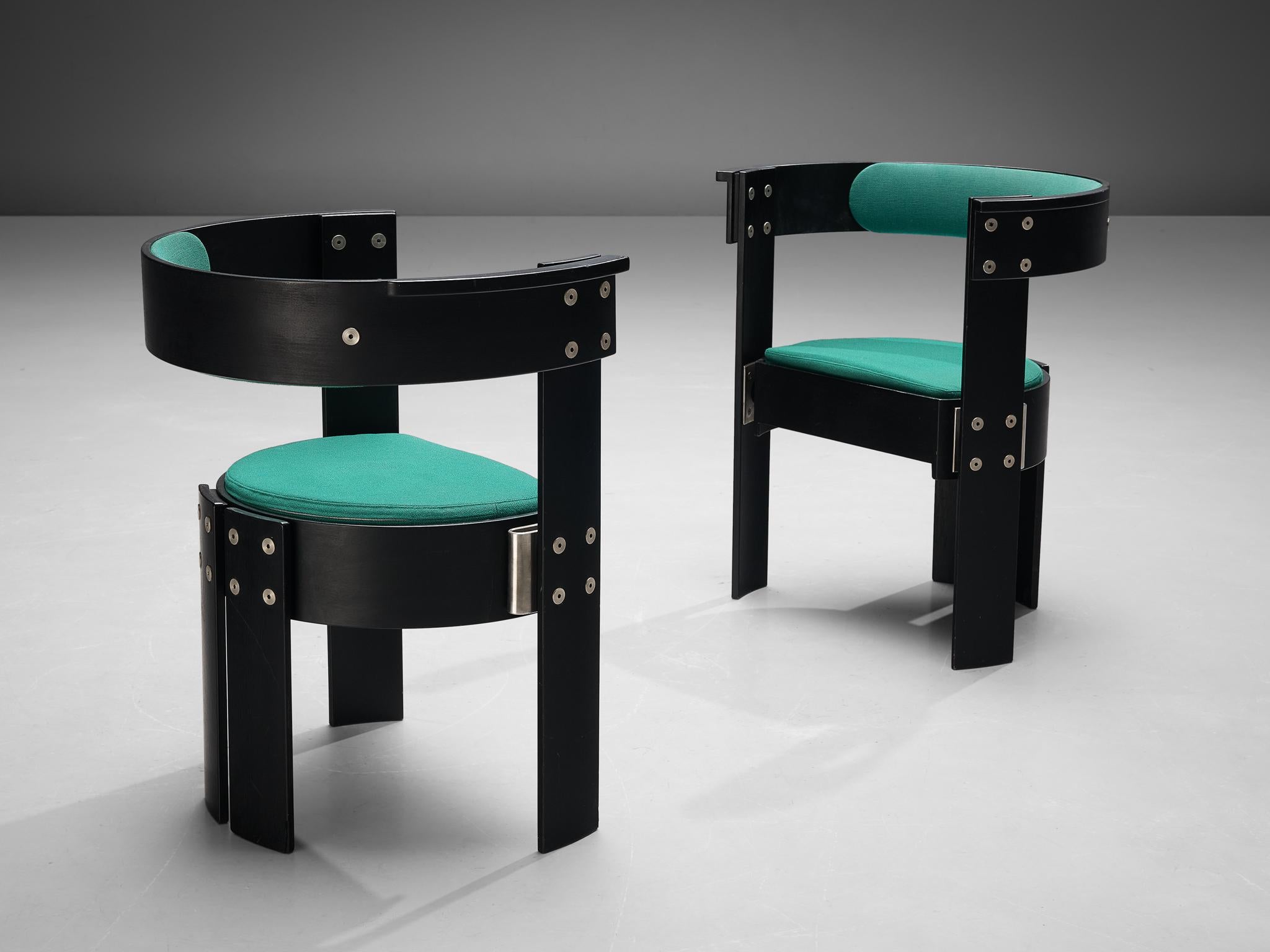 Tarquini Mårtensson, Michael Tarp Jensen, pair of armchairs, black lacquered plywood, metal, wool, Denmark, 1974

This rare pair of chairs was designed by Danish architects Tarquini Mårtensson and Michael Tarp Jensen for Idrættens Hus ('House of