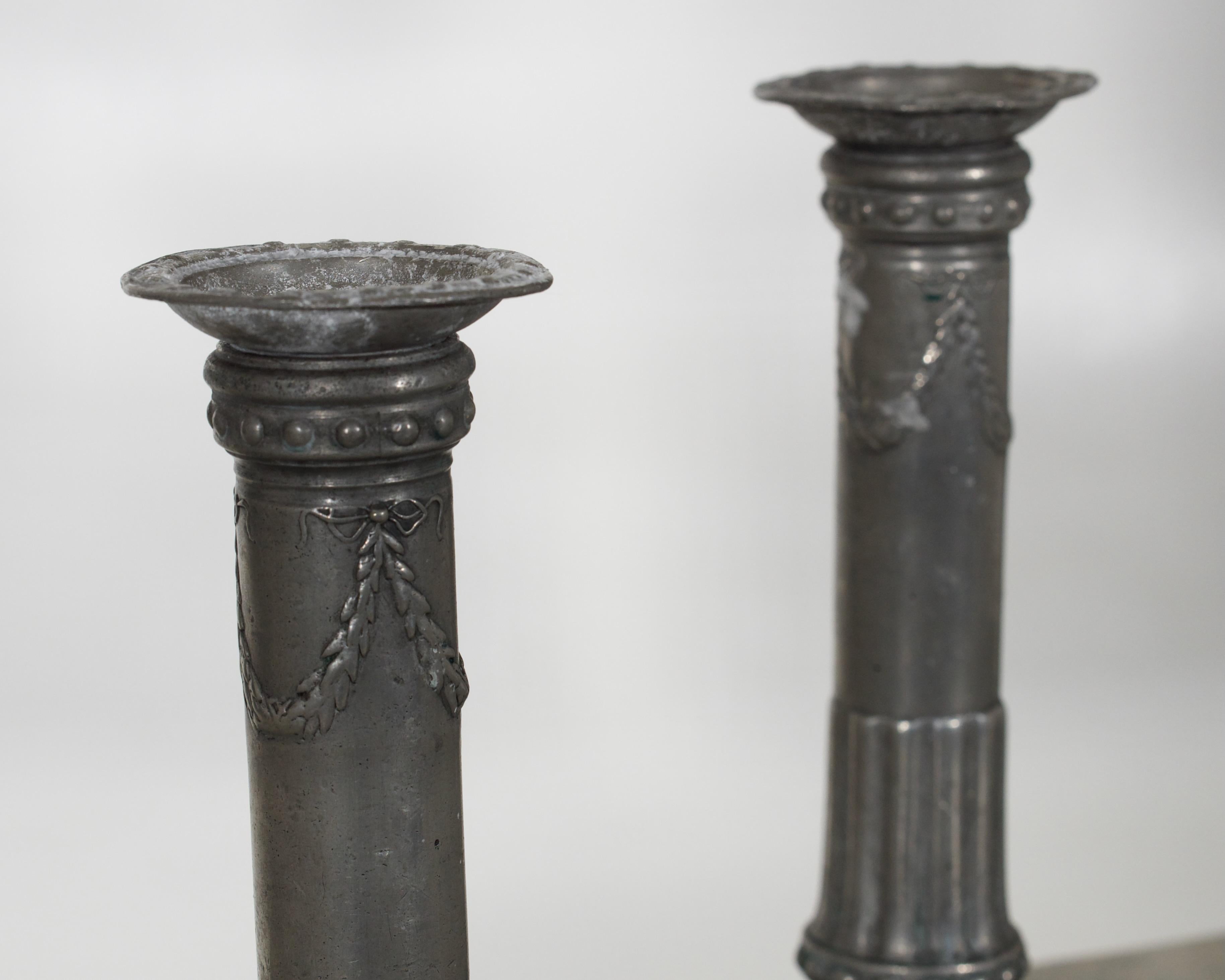 Pair of rare tin candlesticks, signed and dated, circa 1770.
