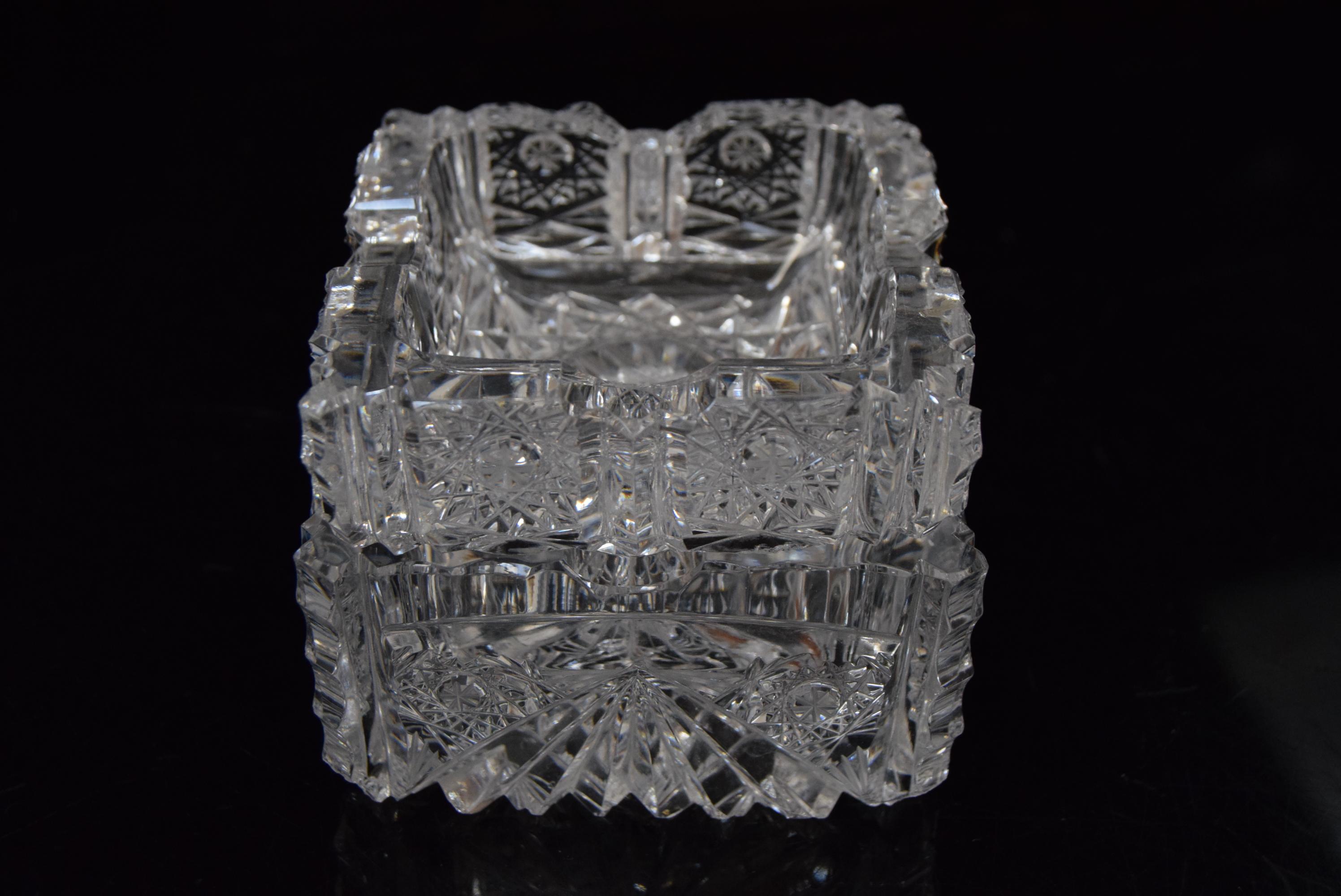 Made in Czechoslovakia
Made of Crystal glass
Larger Ashtray, Size: Height:4,5cm, width and depth 8,5cm
Smaller Ashtray: Height.3cm, width and depth:8cm
Good original condition.