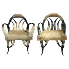 Pair of Rare Vintage Steer Horn & Cowhide Rustic Southwestern Armchairs.