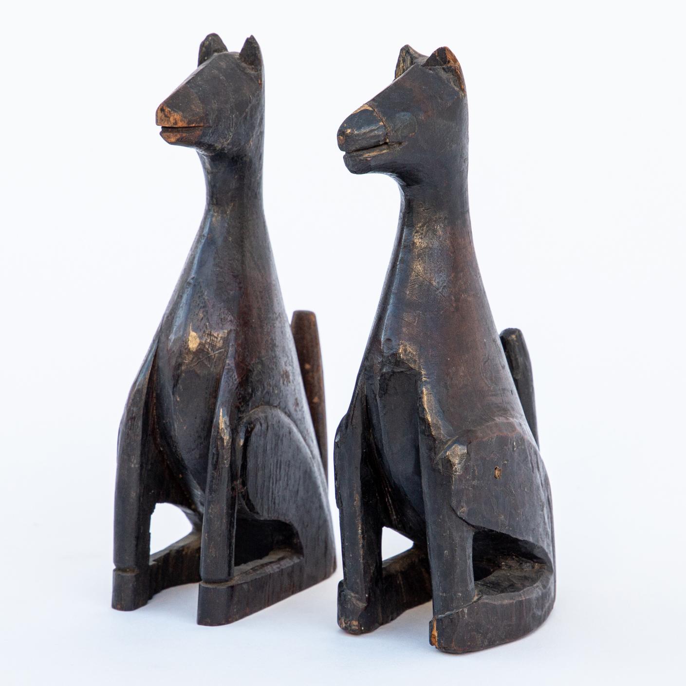 A superb pair of minimally carved, abstracted votive wood fox dolls, the messengers of God based on the Cult of Inari in Japanese culture. Based on their size, these would most likely have formed part of a family’s home shrine or worship place,