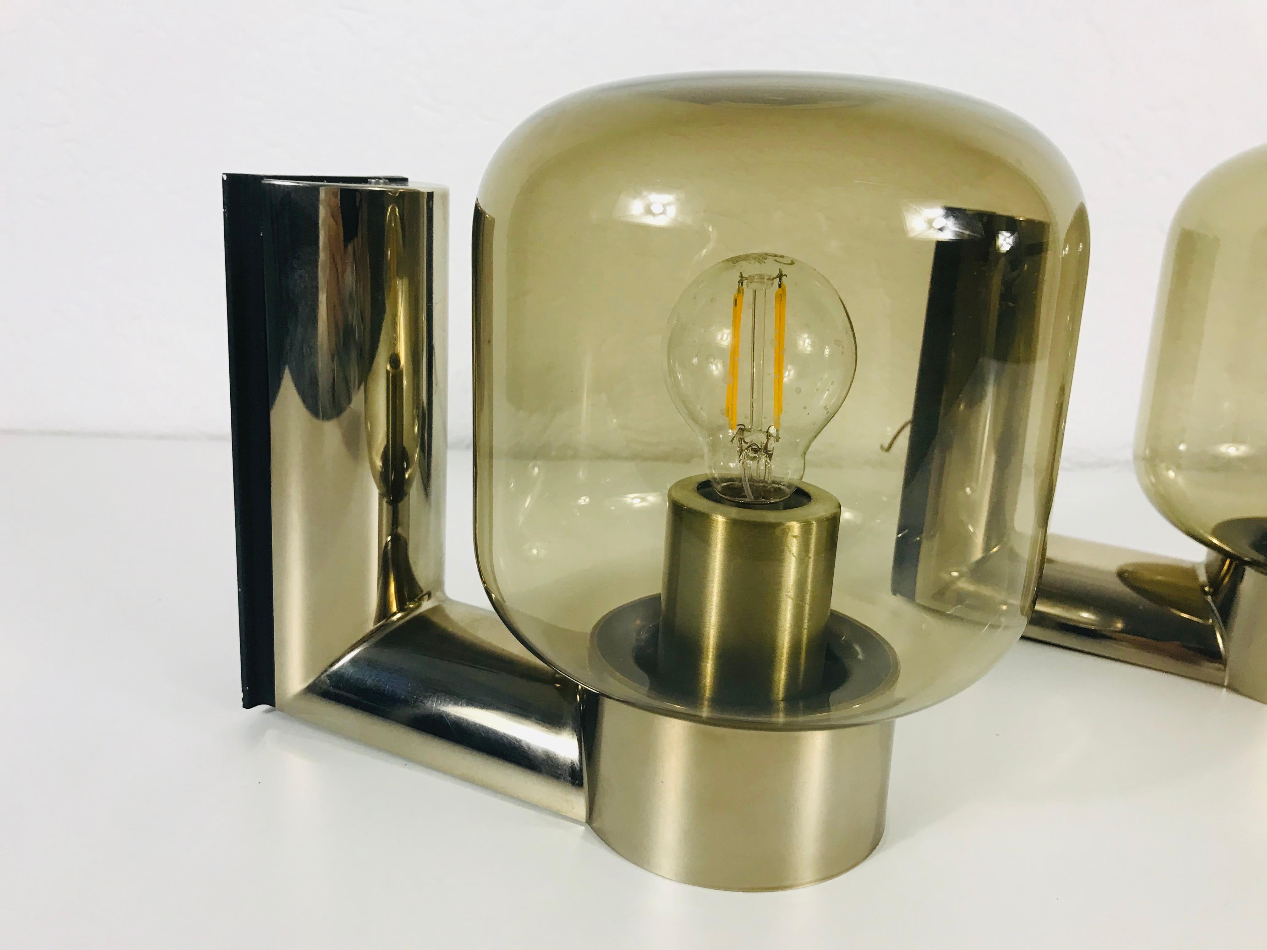 German Pair of Rare Wall Lights by Motoko Ishii for Staff Leuchten, 1970 For Sale