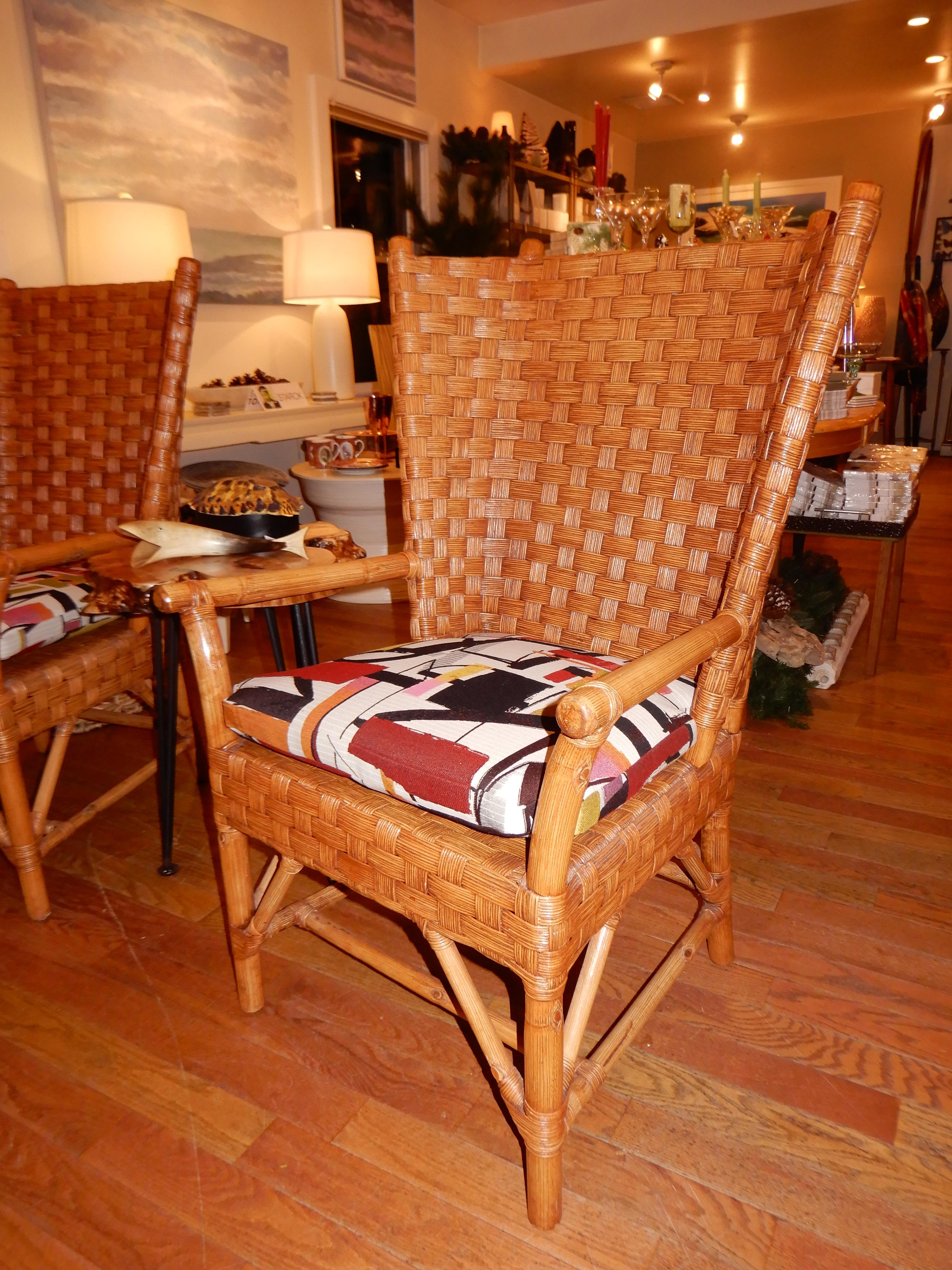 A rare find in these high backed woven rattan Walters Wicker chairs,lovely condition,new cushions in an abstract colourful sunbrella fabric (with zipppers) Comfortable, indoors or porch.