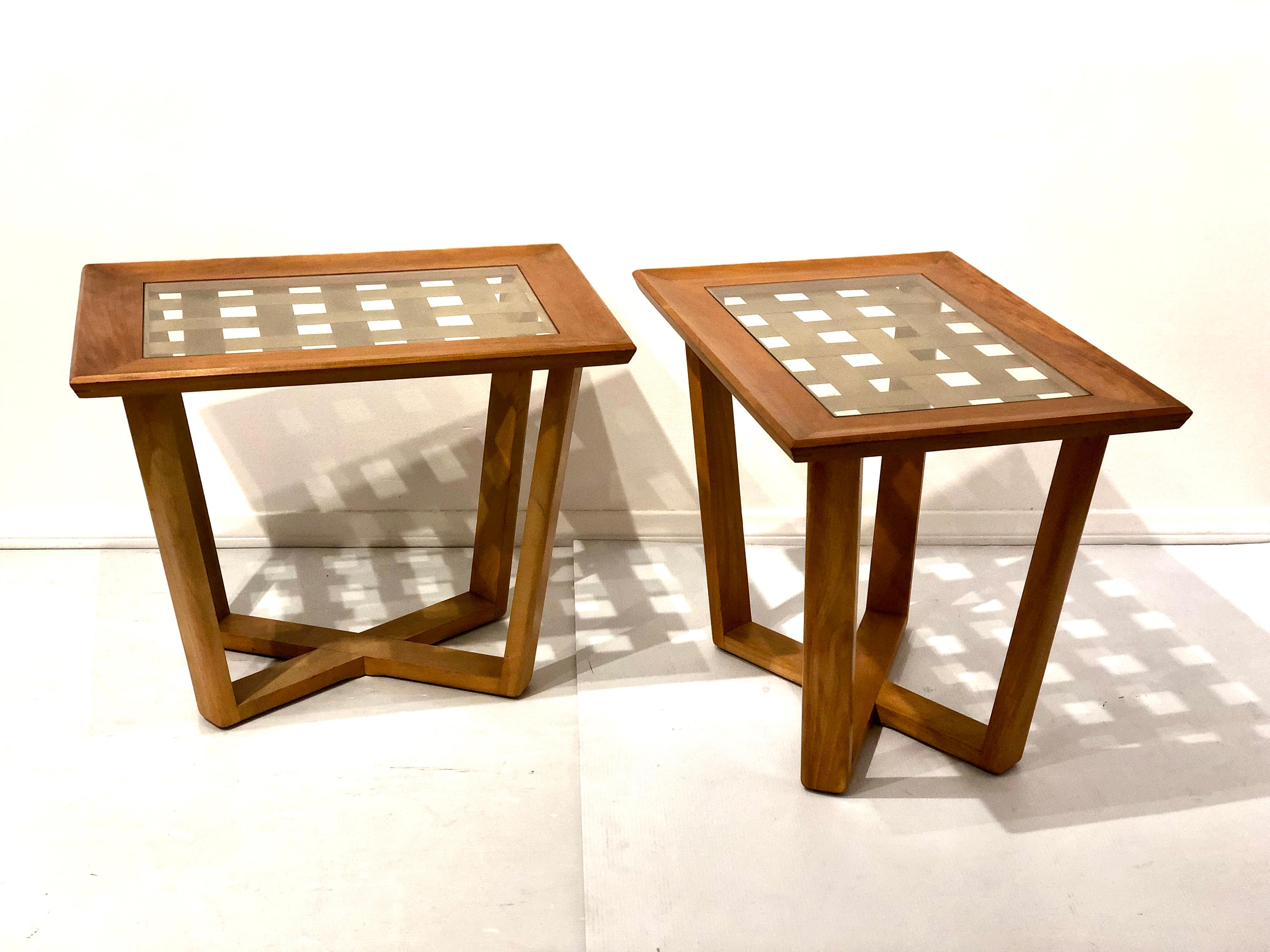 Rare pair of end tables in blonde wood with brass grill centre and glass tops, circa 1950s excellent construction X base solid and sturdy in its original finish, very clean we have clean each table and oil it.