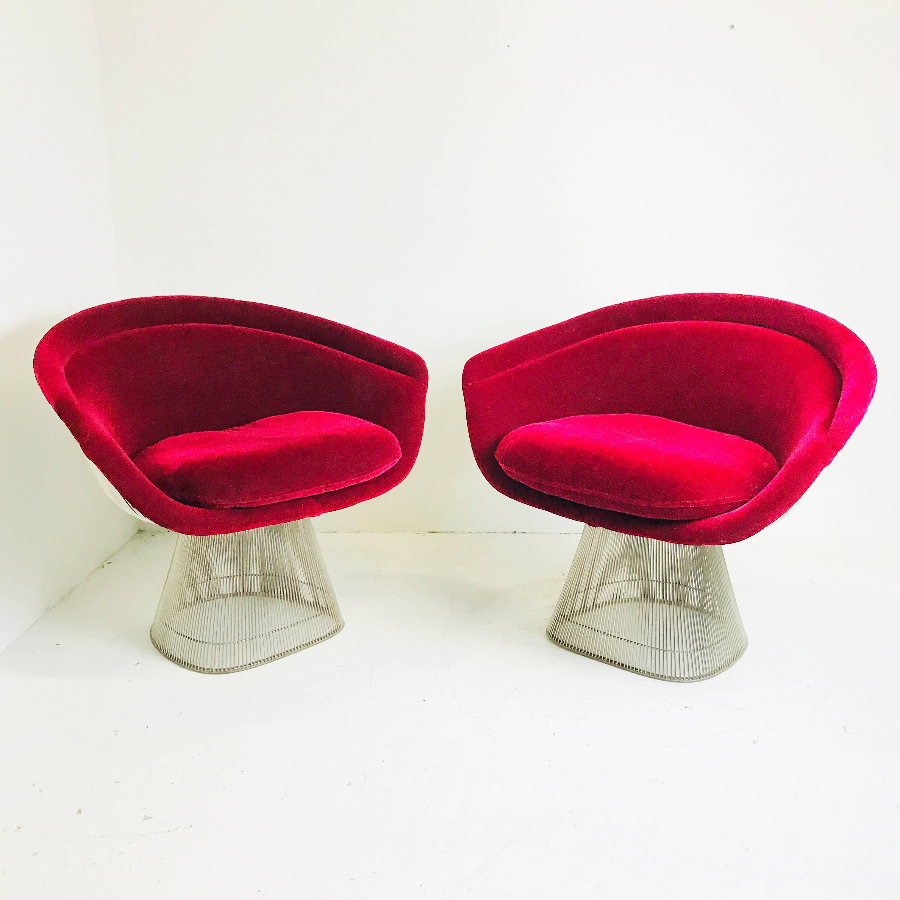 Pair of raspberry velvet Warren Platner lounge chairs. Chairs are in good clean condition with minimal wear.

Dimensions: 32