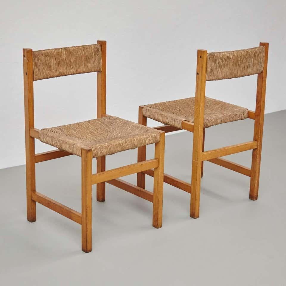 Wood Pair of Rationalist Rattan Spanish Chairs, circa 1960 For Sale