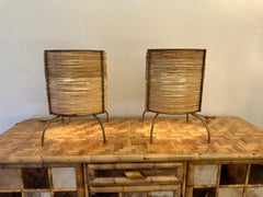 Paire de lampes en rotin et métal doré. Italie, années 2000