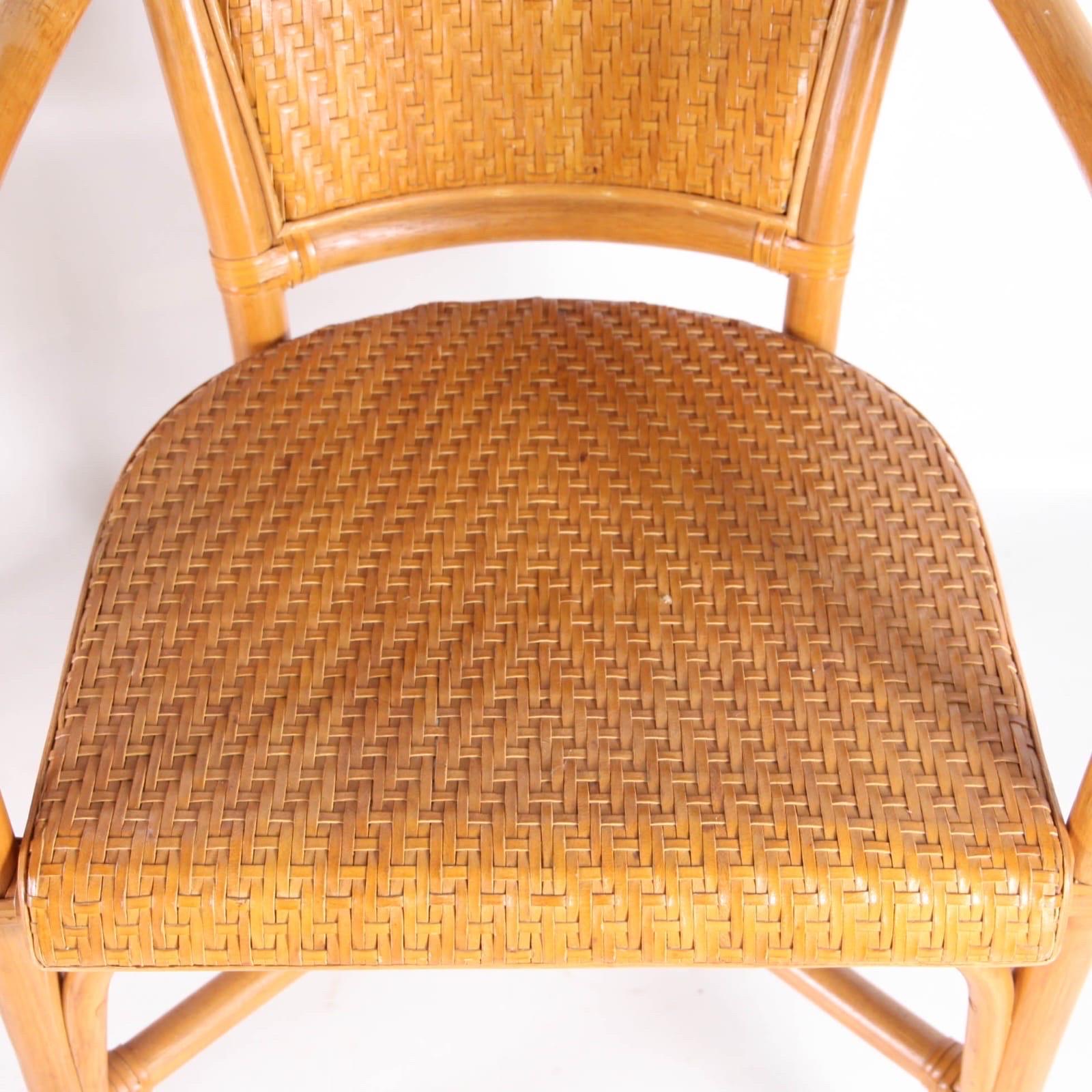 Pelle Coppia di poltrone in rattan e pelle intrecciata a mano in vendita