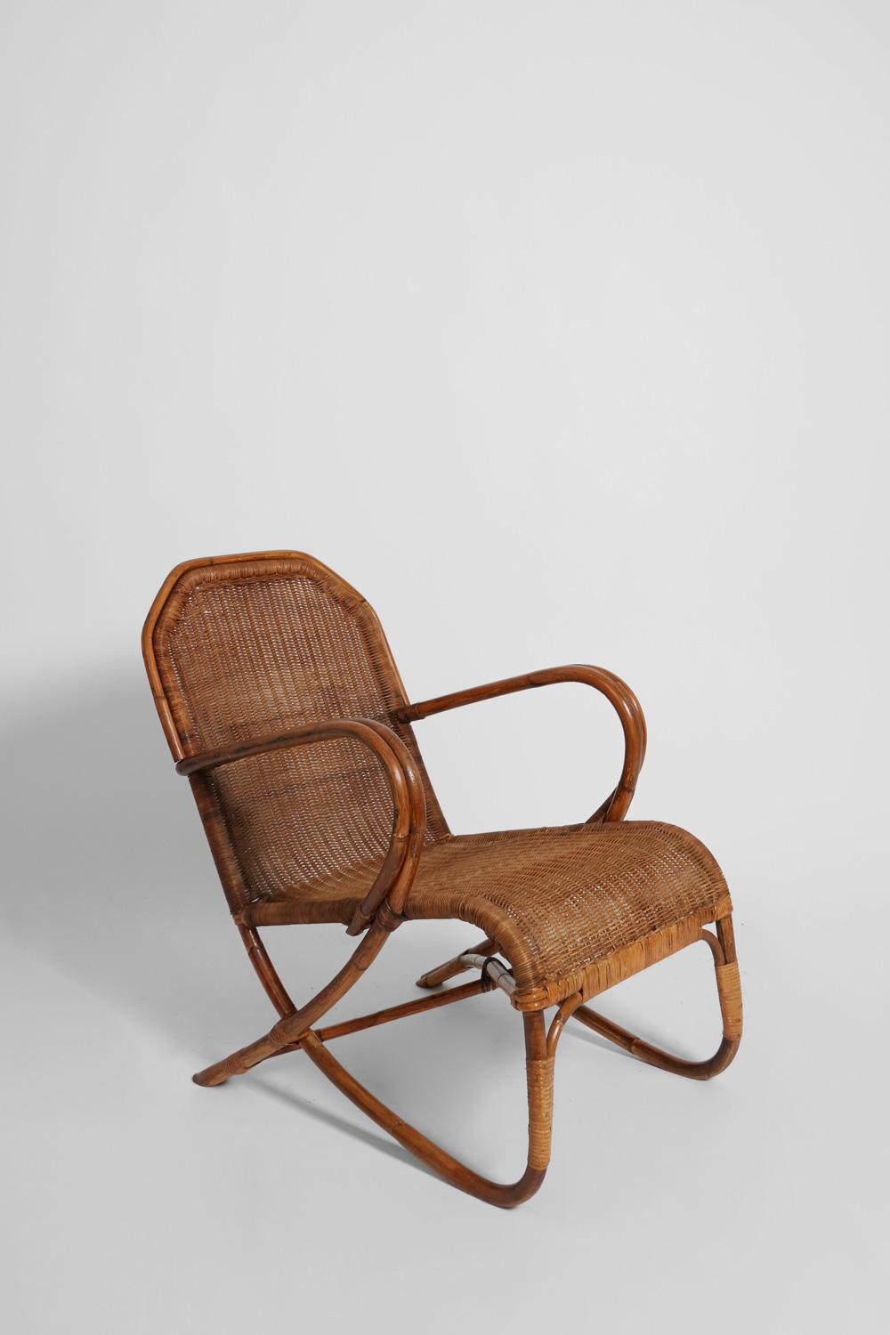 Pair of rattan and wicker armchairs. France, 1950s.