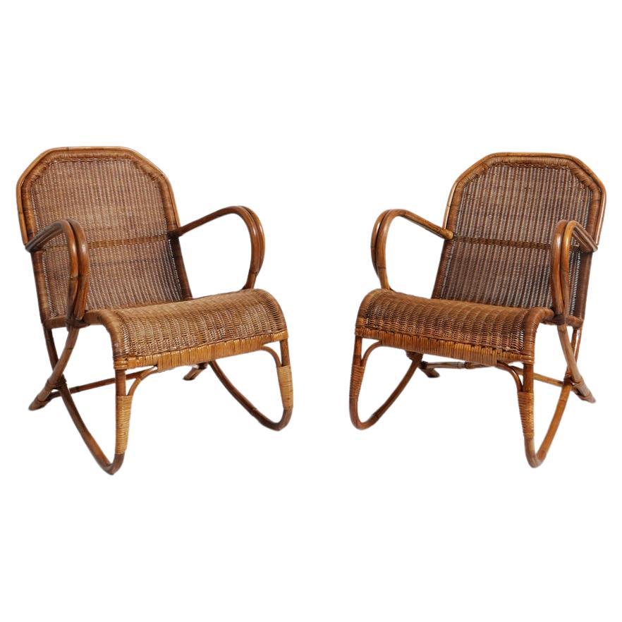 Pair of rattan and wicker armchairs, 1950s.