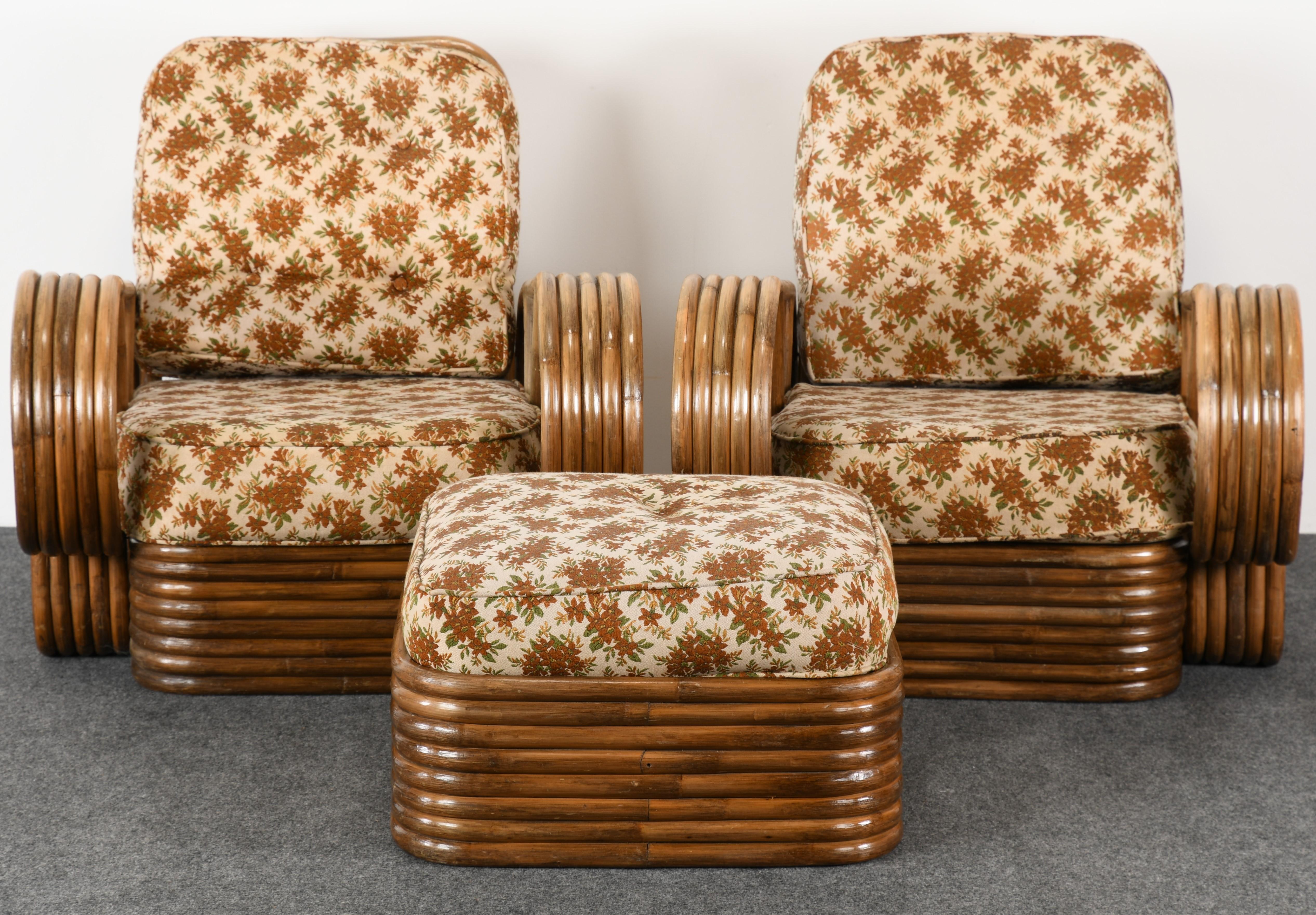 A stunning pair of Paul Frankl Style rattan armchairs or lounge chairs with ottoman. Chairs and Ottoman are structurally sound and in good condition with age-appropriate wear. Ottoman has cross band that was repaired. New upholstery