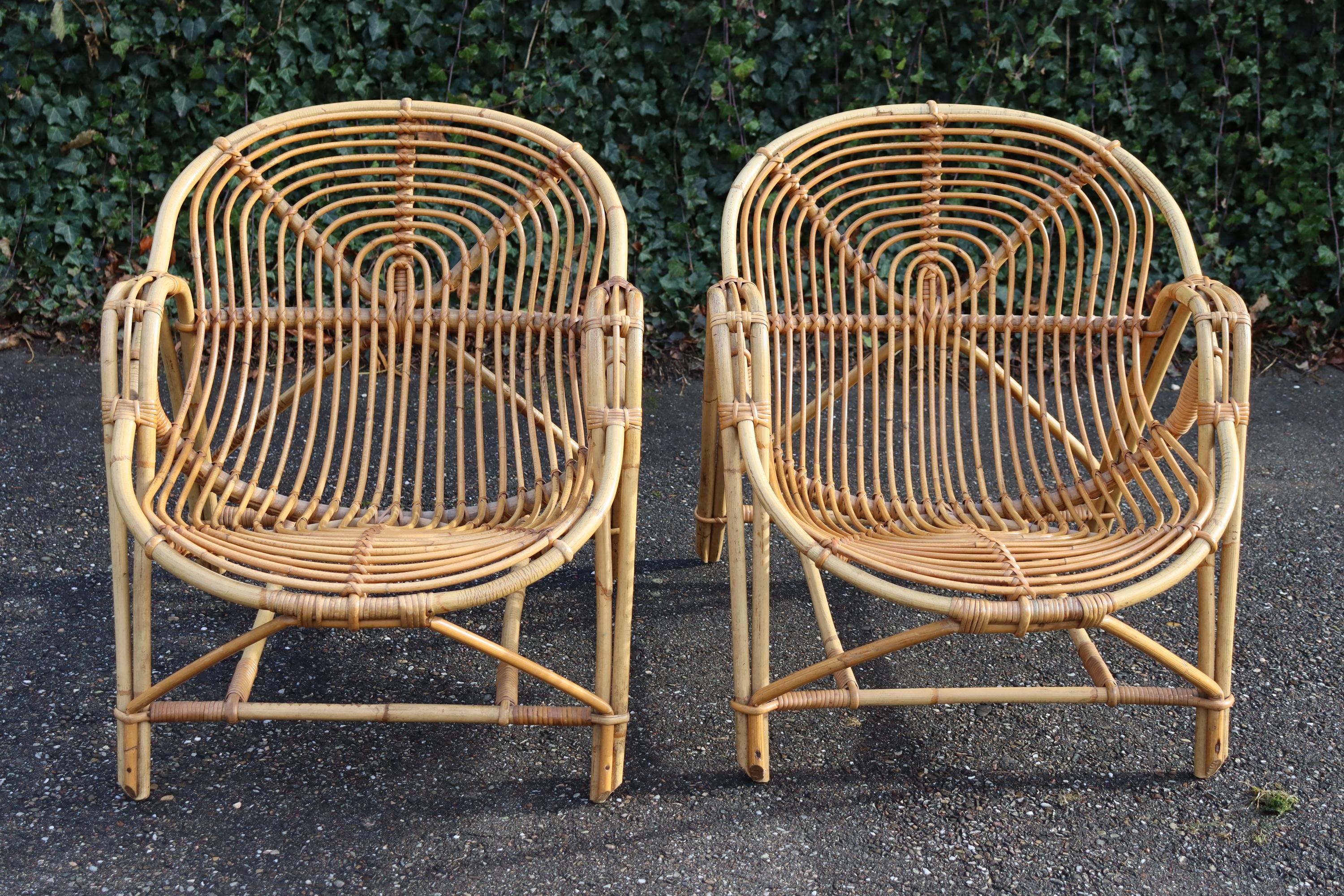 Pair of rattan armchairs, circa 1950/60. Excellent original condition. Attributed to Audoux Minnet
