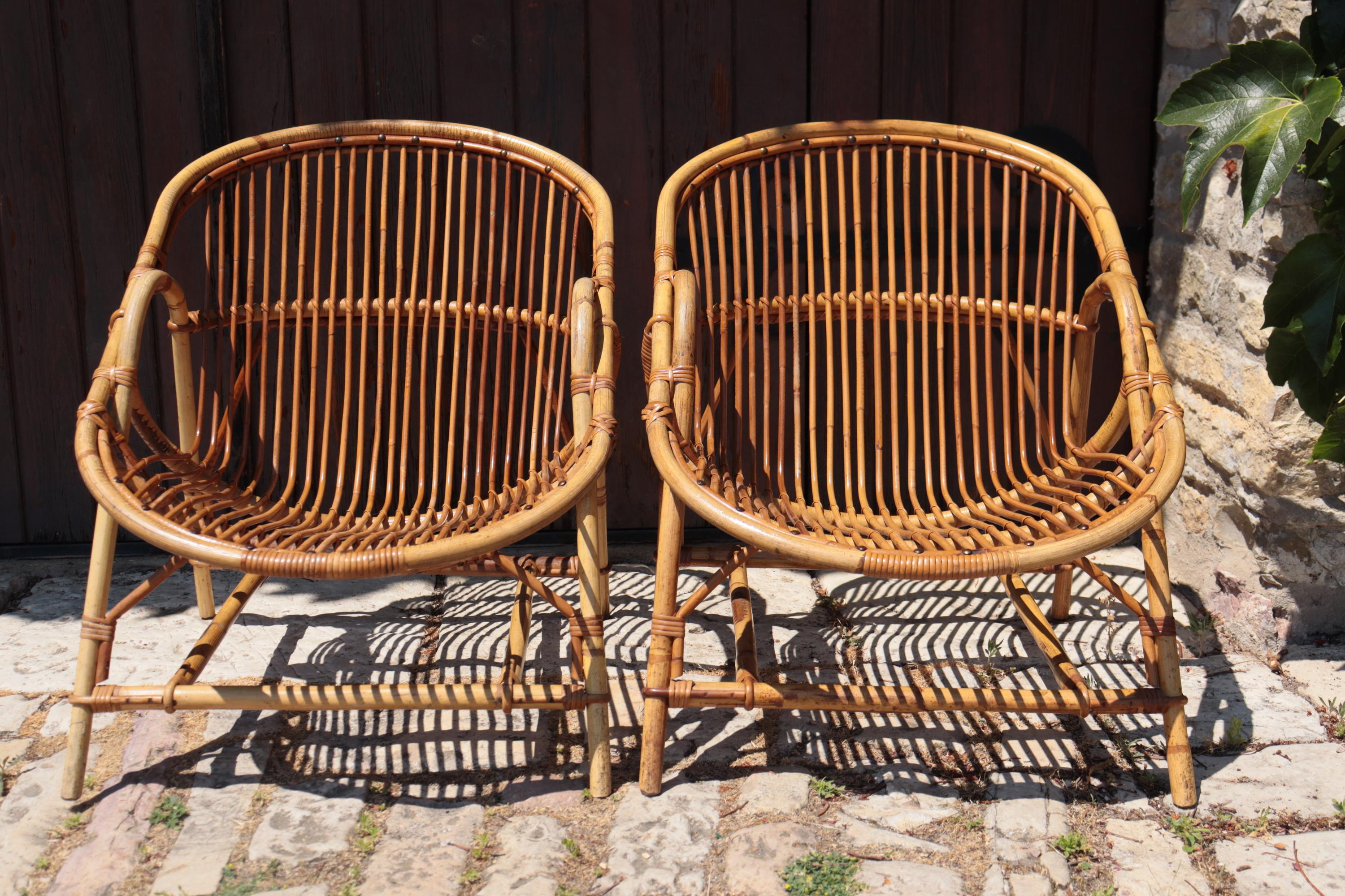 Pair Of Rattan Armchairs By Audoux-minnet Bon état - En vente à Charmes, FR