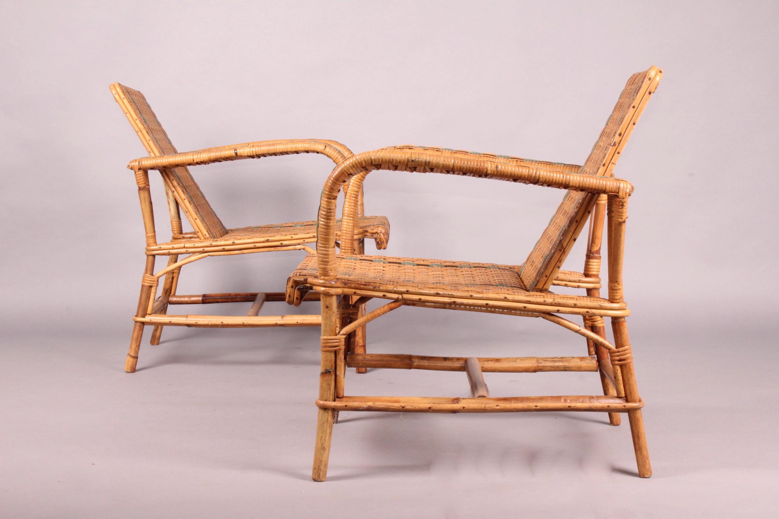 Pair of Rattan Armchairs In Good Condition In grand Lancy, CH