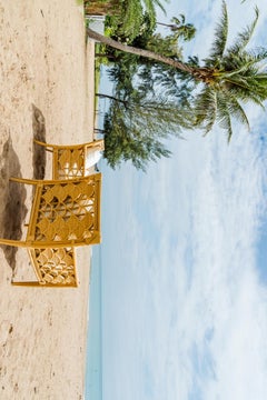 Pair of rattan armchairs