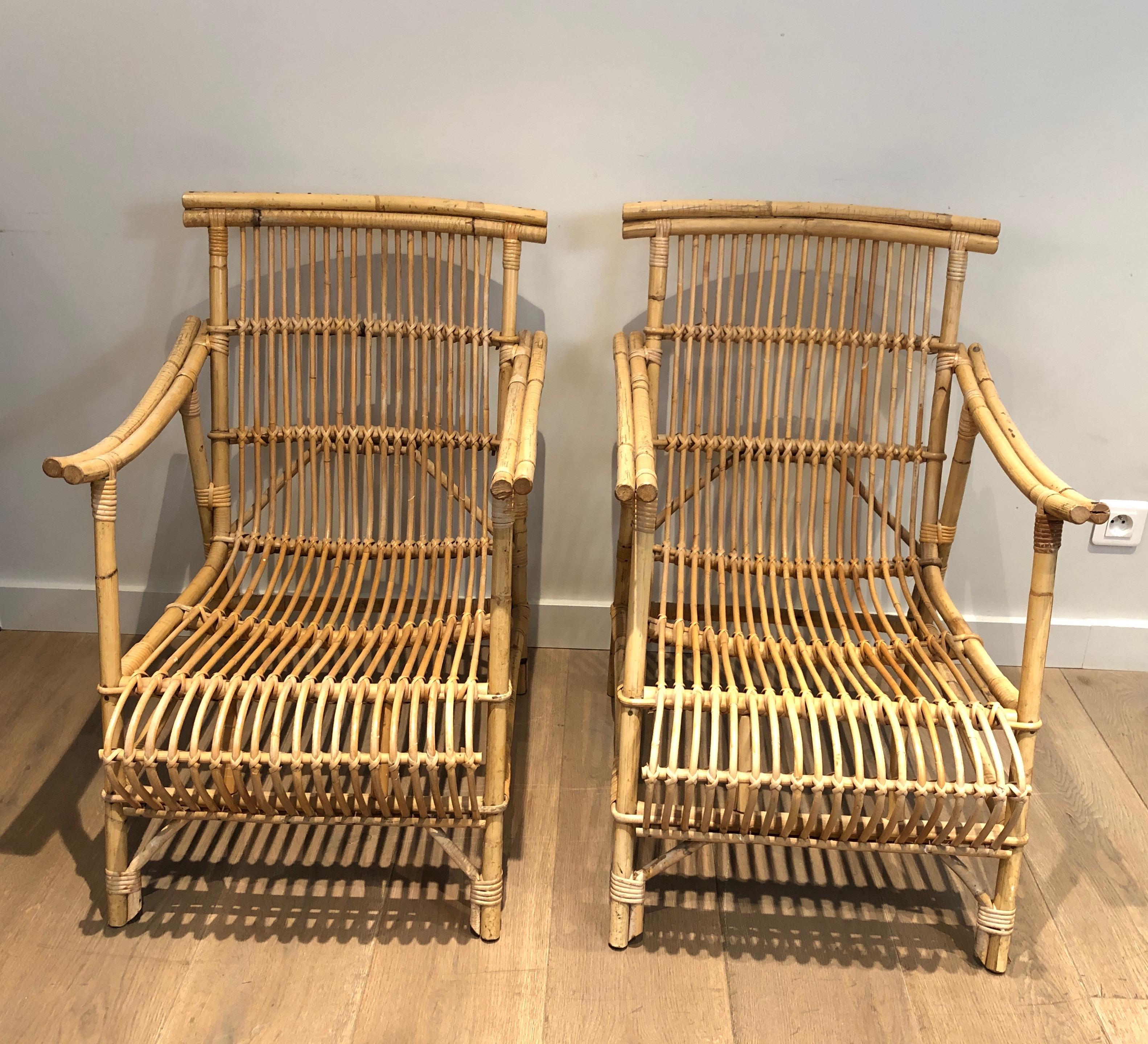 Mid-Century Modern Pair of Rattan Armchairs. French Work, circa 1950 For Sale