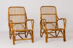 Pair of Rattan Armchairs in the Style of Audoux Minnet - France 1960's
