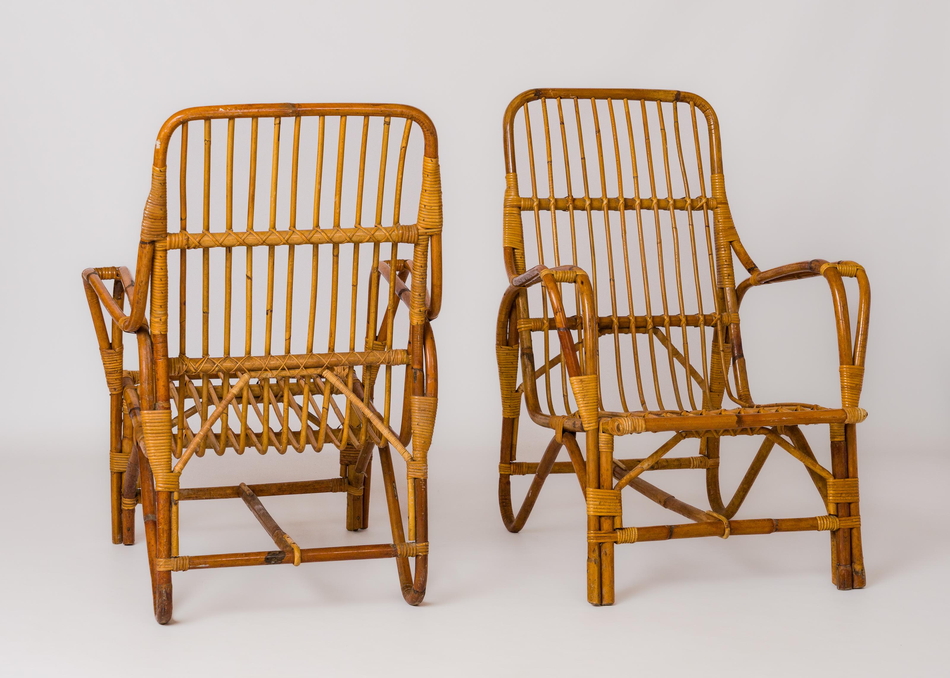 Francese Coppia di poltrone in rattan nello stile di Audoux Minnet - Francia anni '60 in vendita