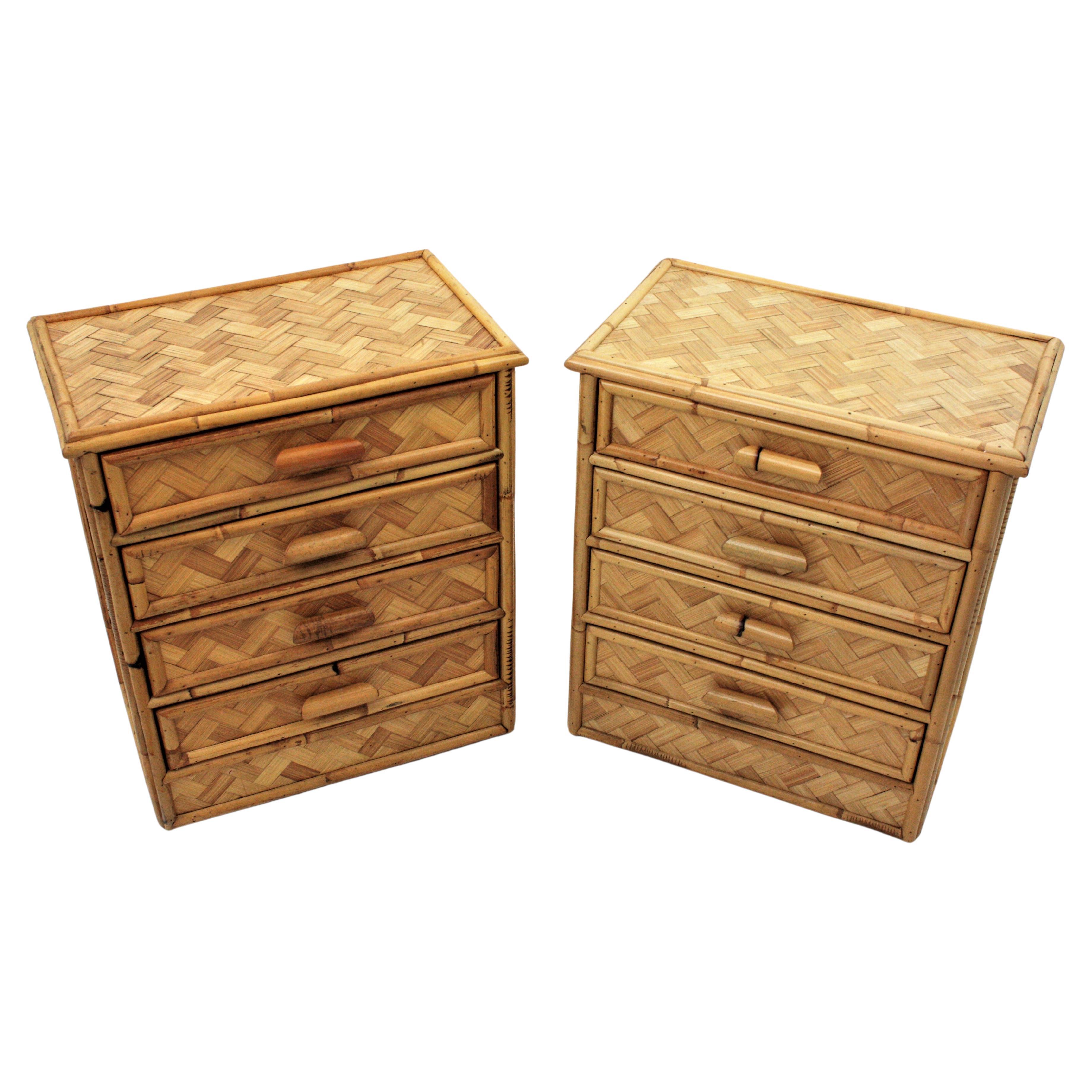 Pair of Spanish Modern bamboo four-drawer end table stands or small chests, 1970s. 
Eye-catching pair of woven bamboo and rattan bedside tables, end tables or nightstands. These small chests of drawers have a rattan and bamboo construction.