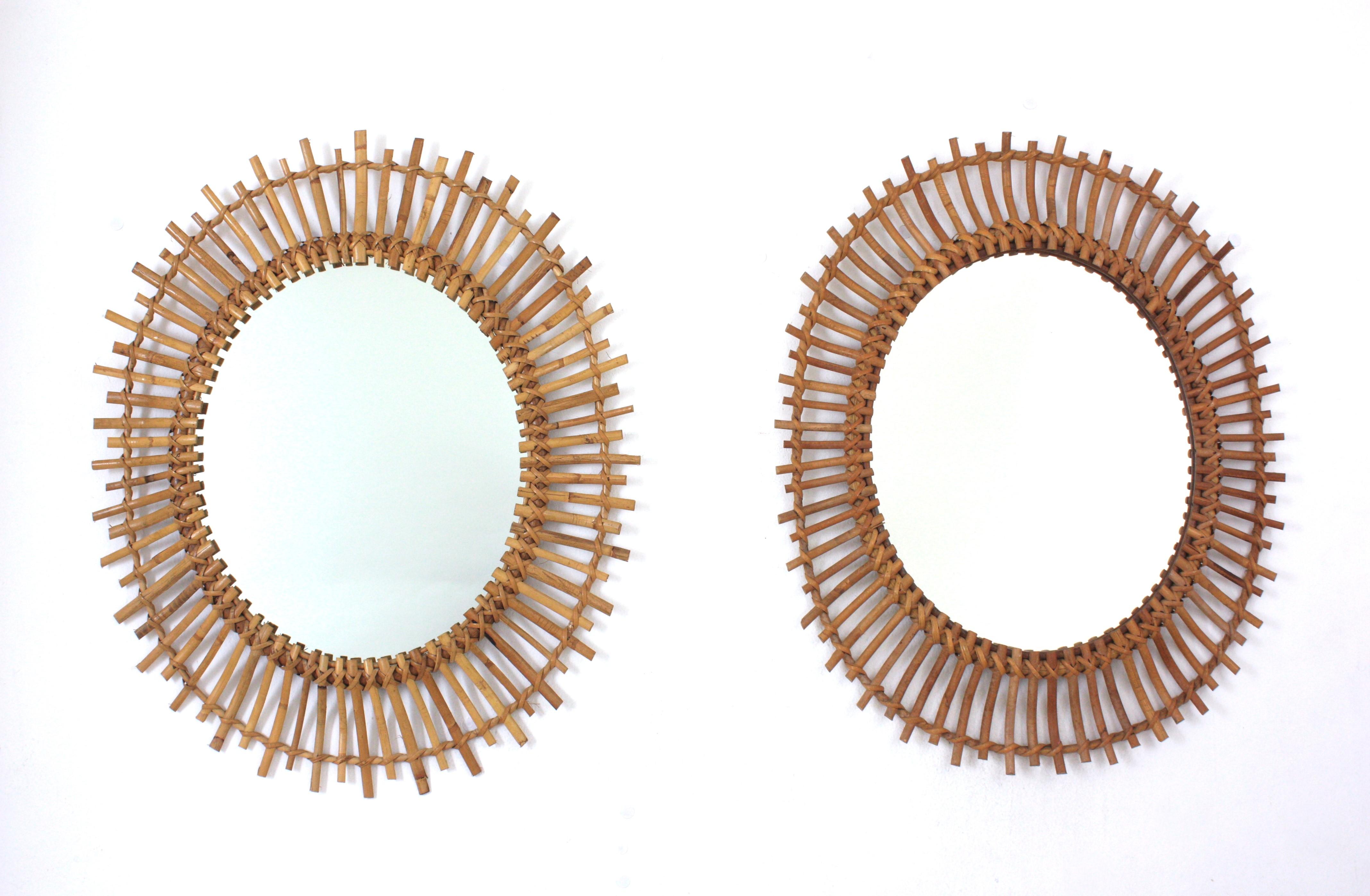 Pair of Spanish Sunburst Oval Mirrors in Rattan
Amazing pair of bamboo and rattan sunburst oval mirrors. Handcrafted in Spain, 1960s.
They have all the taste and freshness of the Mediterranean Coast.
Lovely placed hanging above a double vanity in a