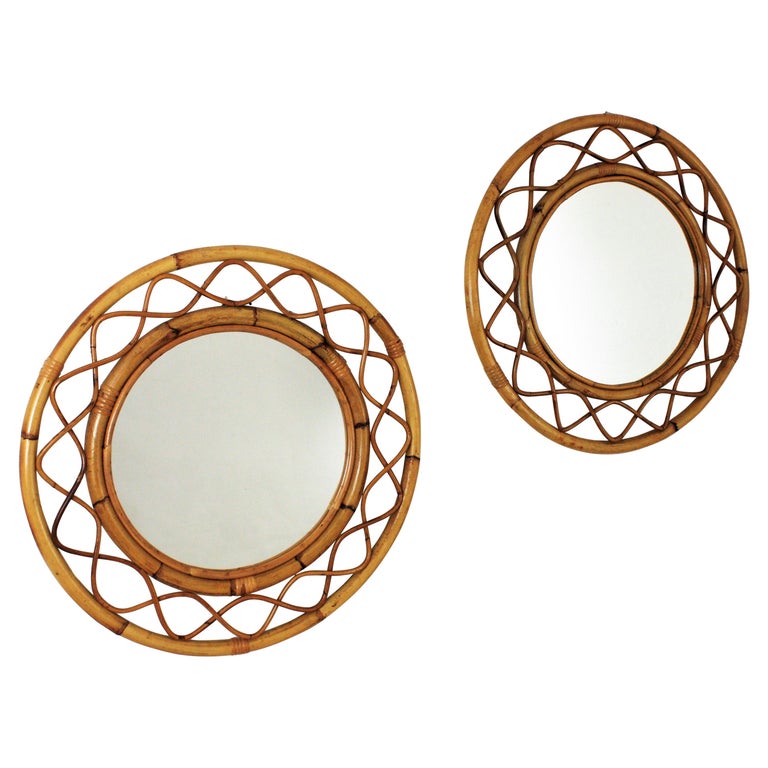 French modern round mirrors, bamboo, rattan. France, 1960s
These mirrors feature two concentric bamboo frames with an intrincated undulated rattan pattern between them. In the style of Franco Albini designs.
These mirrors will add a fresh