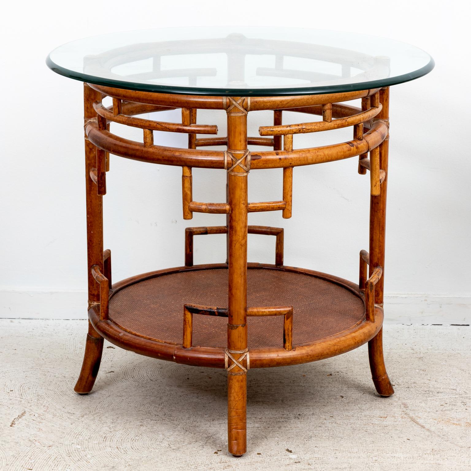 Pair of Rattan Chippendale Style Round Tables with Glass Tops In Good Condition In Stamford, CT