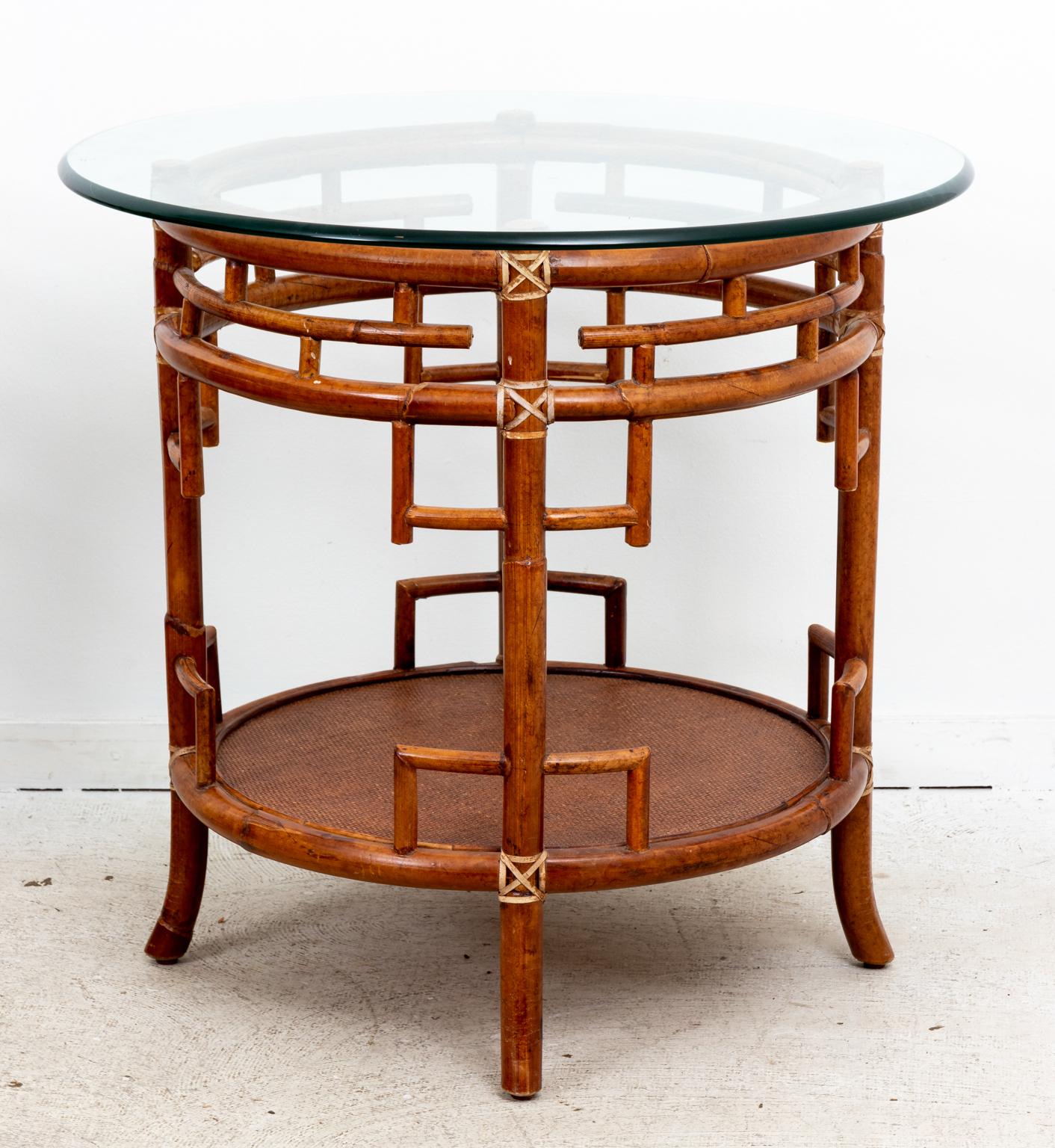 Late 20th Century Pair of Rattan Chippendale Style Round Tables with Glass Tops