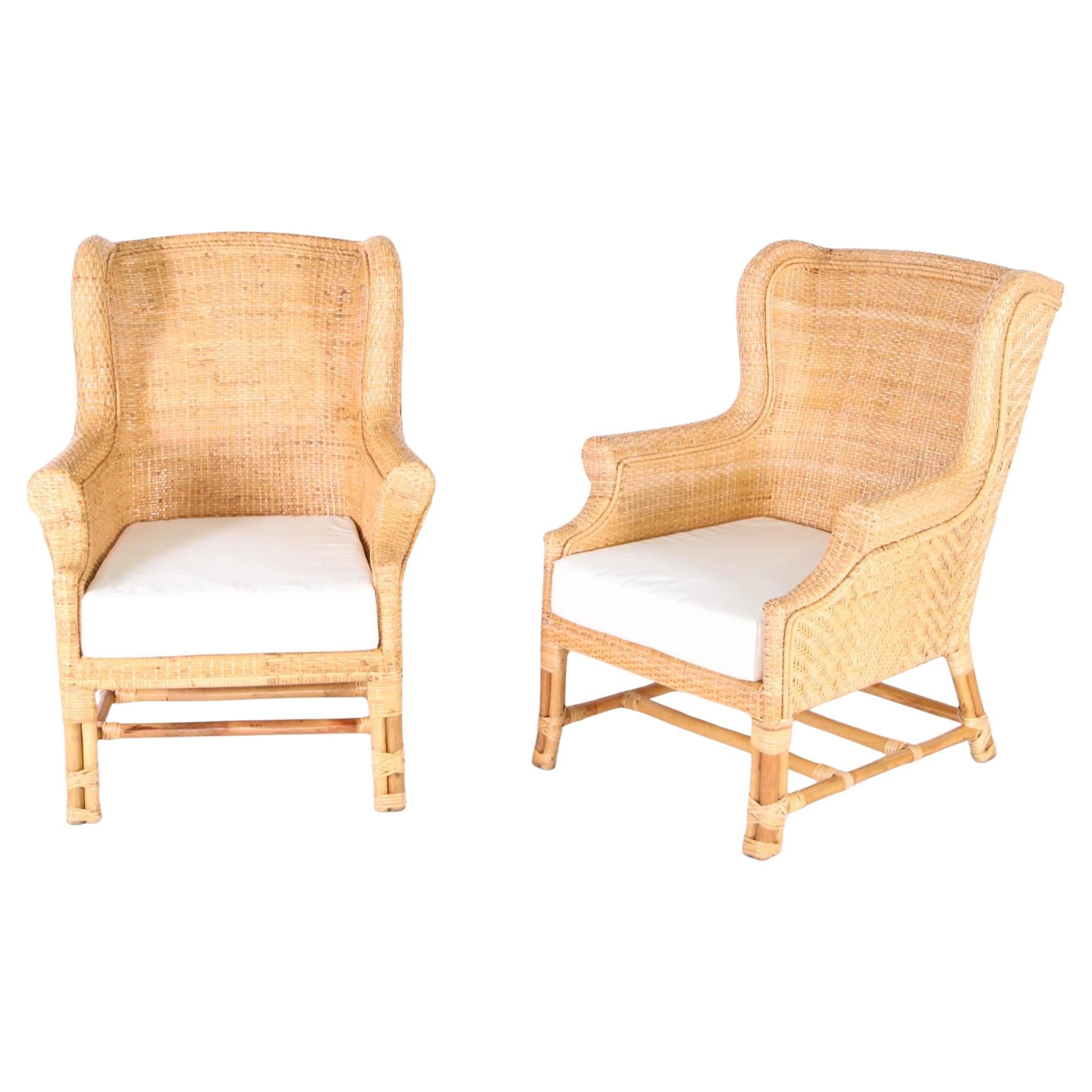 Paire de fauteuils club en rotin