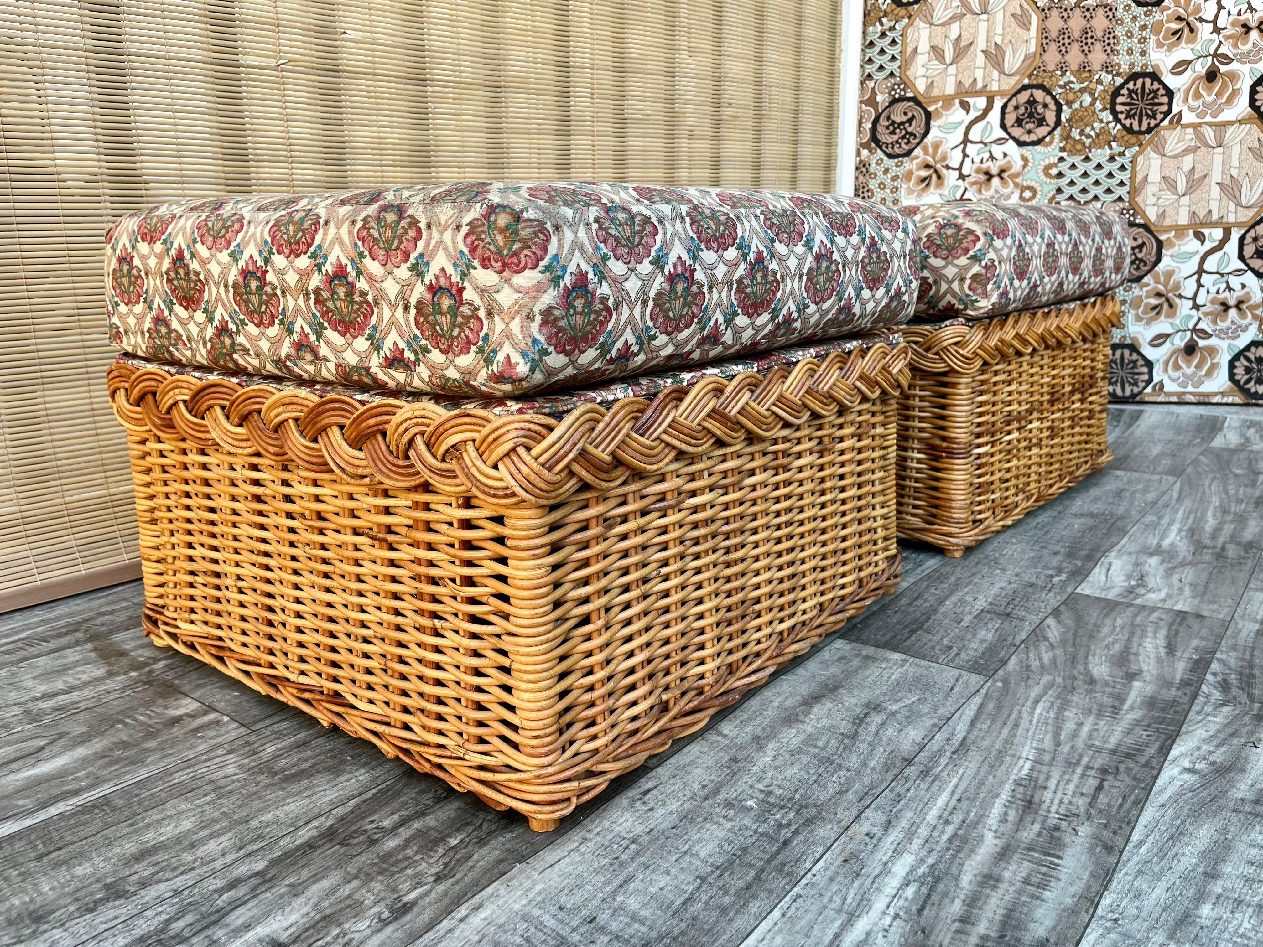 A Pair of Vintage Large Scale, Natural Wicker/Rattan Coastal Style Ottomans in the Bielecky Brothers' manner. Circa 1970s
Features a beautiful glowing honey colored weaved rattan frame with an elegant braided trim detail at top edges, with removable