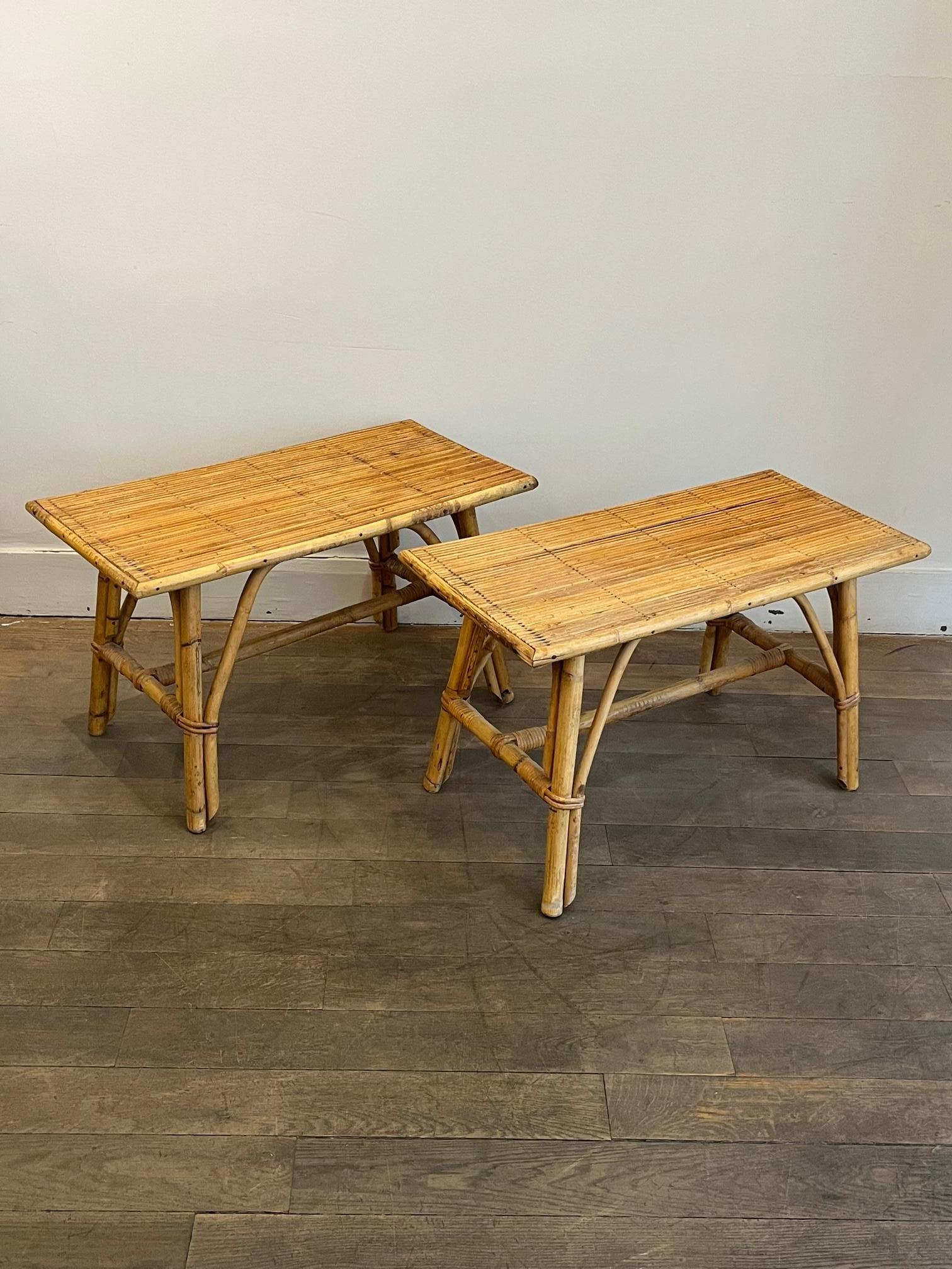 A pair of rectangular rattan end tables
rattan top
In the taste of Audoux-Minnet garden furniture 
Can also be used as coffee tables
South of France circa 1960's