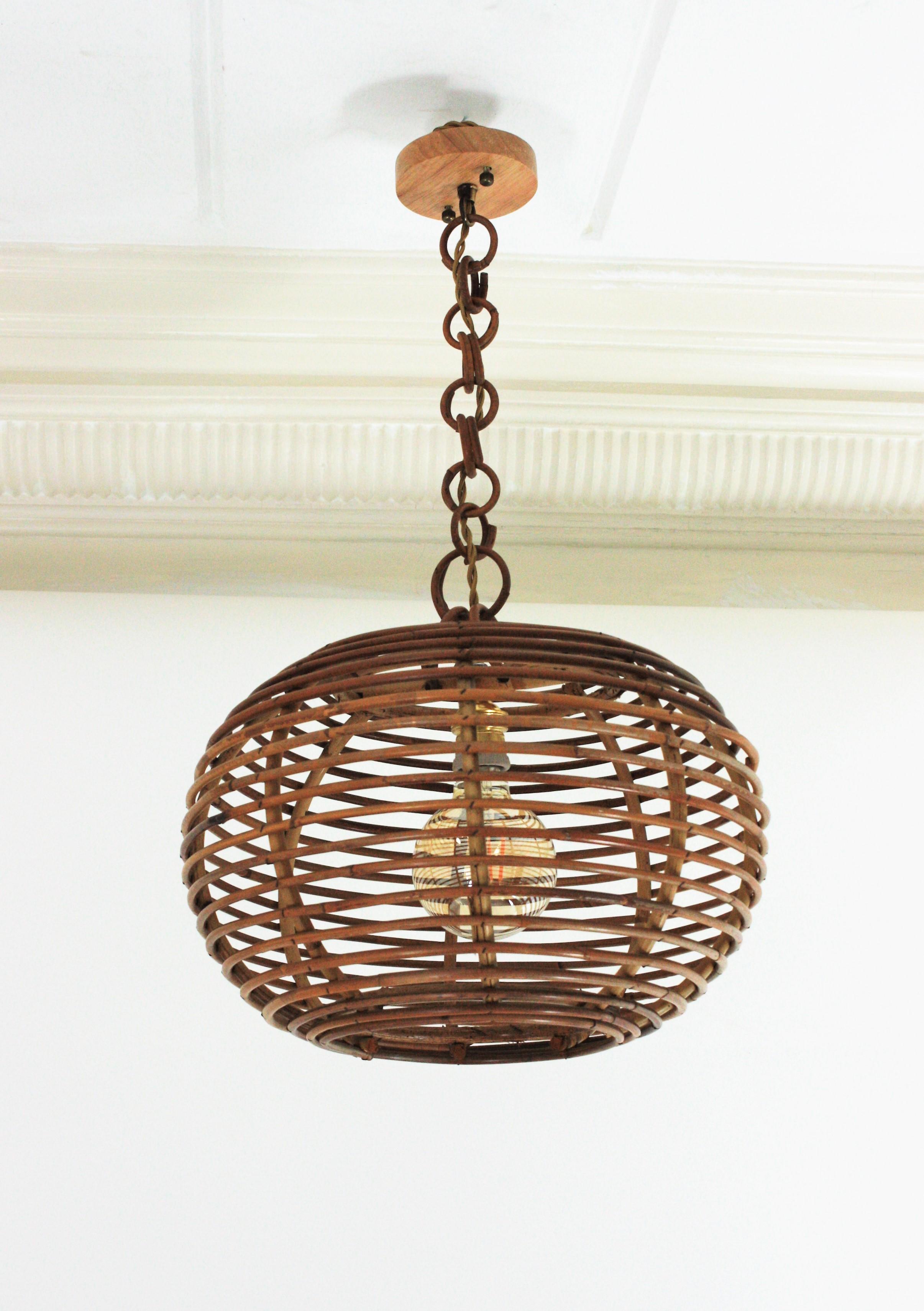 Mid-Century Modern Pair of Rattan Globe Pendants or Hanging Lights, 1950s For Sale