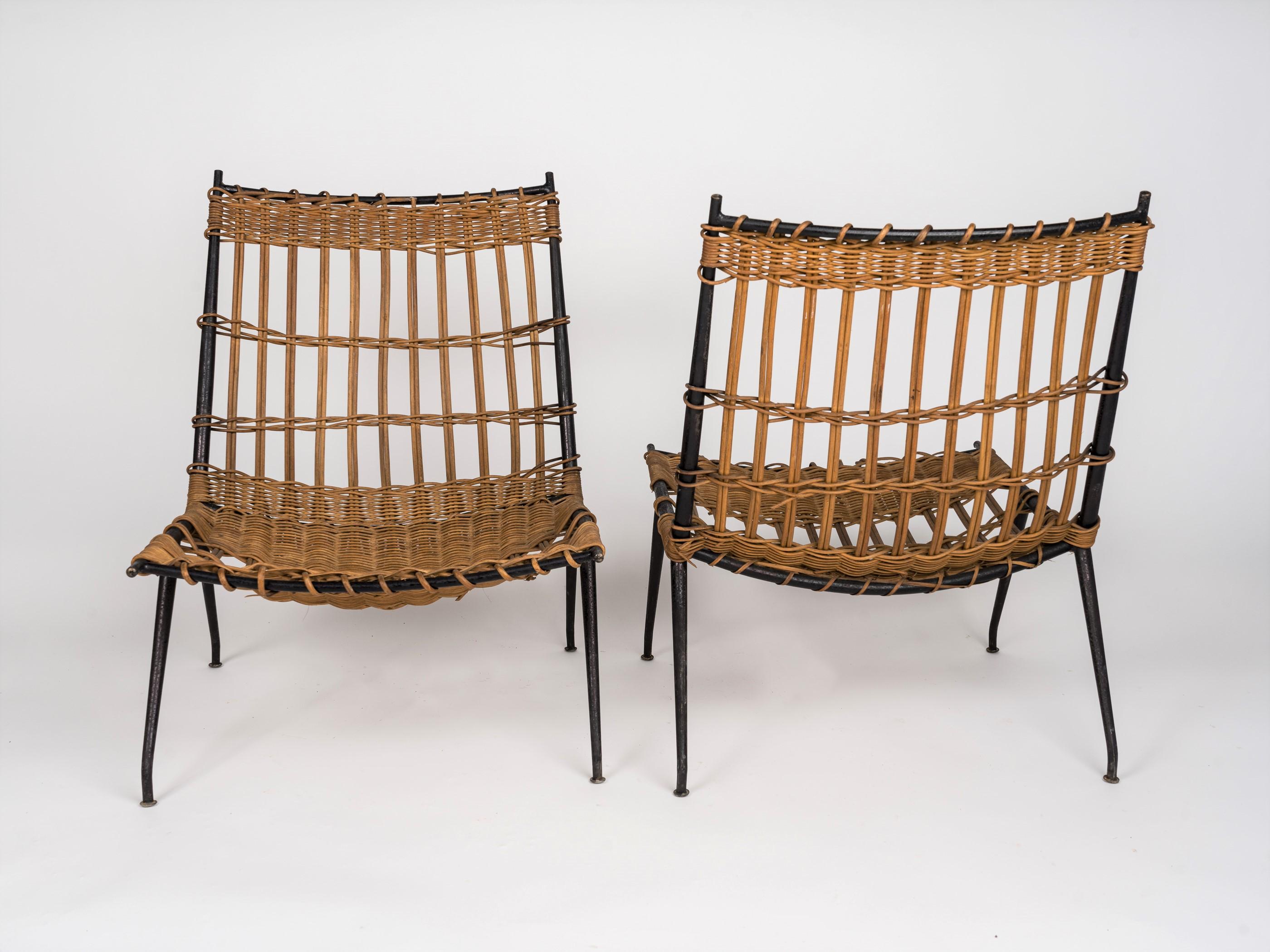Pair of Rattan & Lacquered Iron Chairs by Raoul Guys, France 1950's In Fair Condition For Sale In New York, NY
